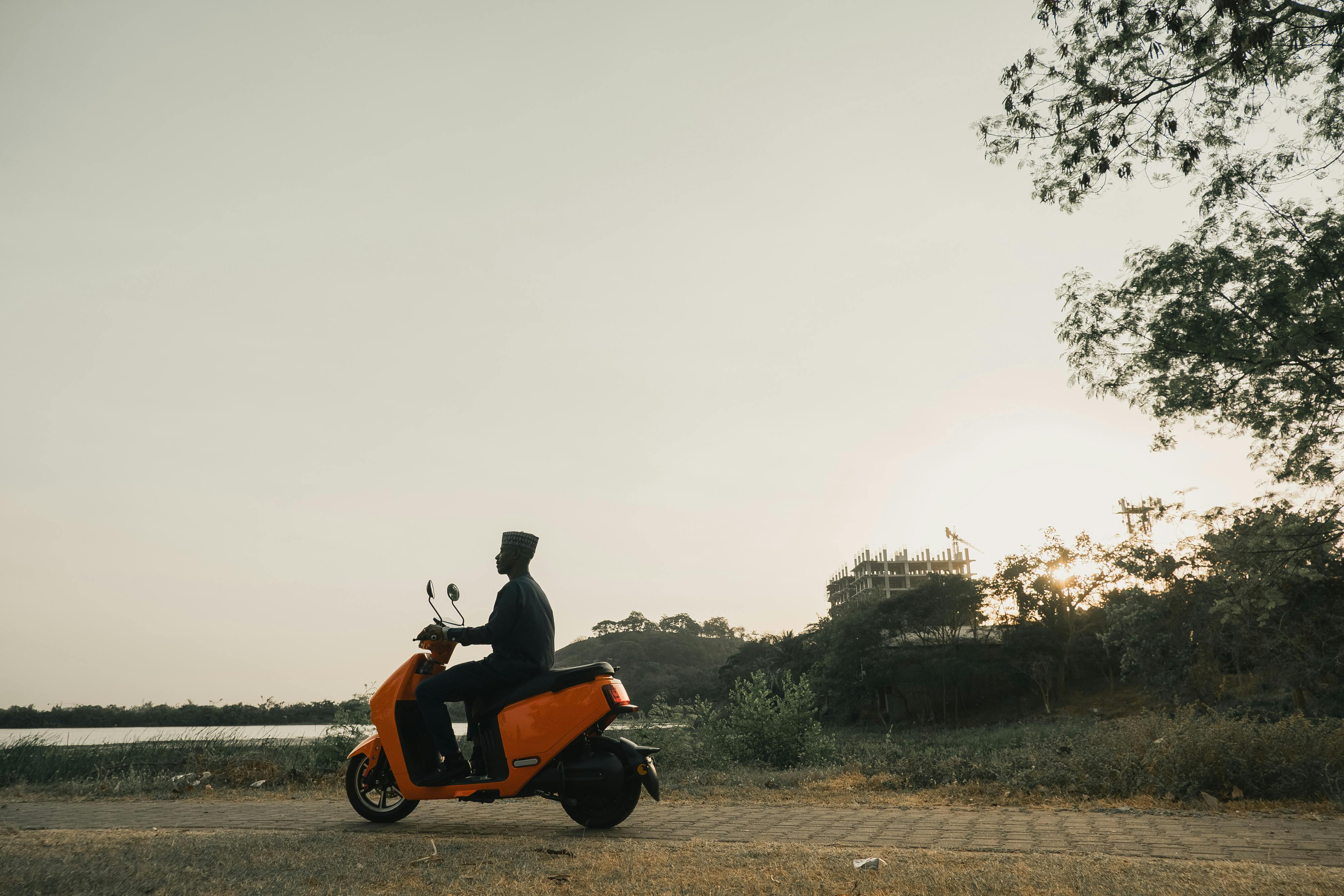 Hands performing maintenance on mobility scooter battery compartment