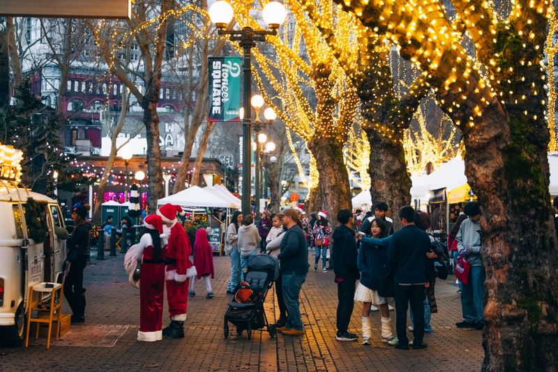 Festive holiday gathering at Pioneer Square in Seattle