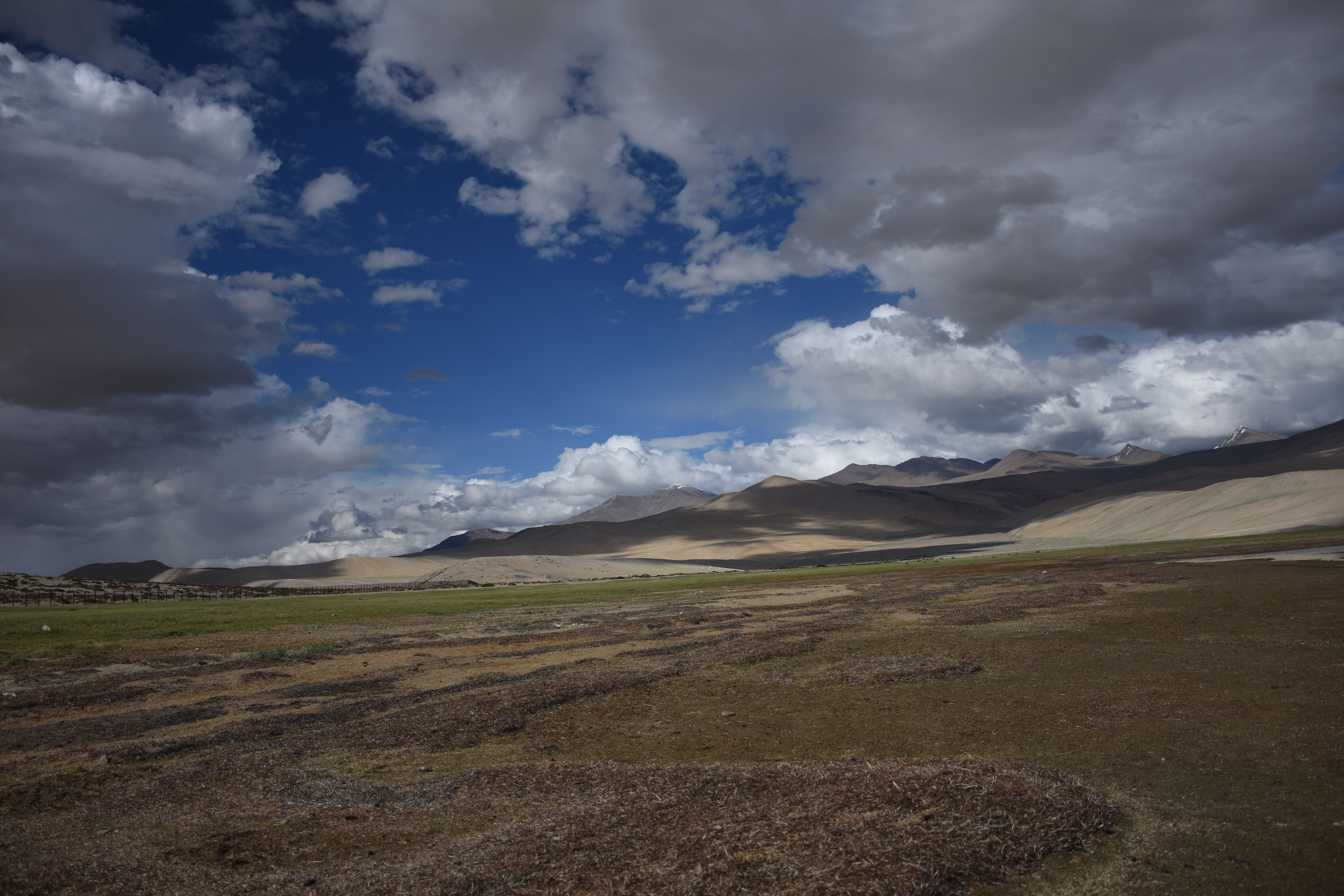 Scenic Mountain Landscape with Dramatic Clouds · Free Stock Photo