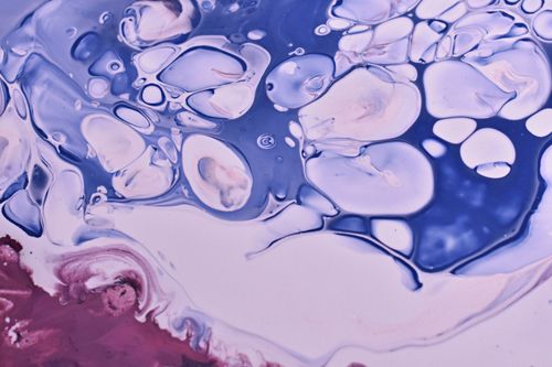 Free Explore a vibrant mix of colors and textures in this captivating fluid art piece, perfect for modern design. Stock Photo