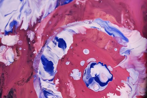 Free Dynamic abstract artwork featuring swirling vibrant colors in fluid acrylic style. Stock Photo