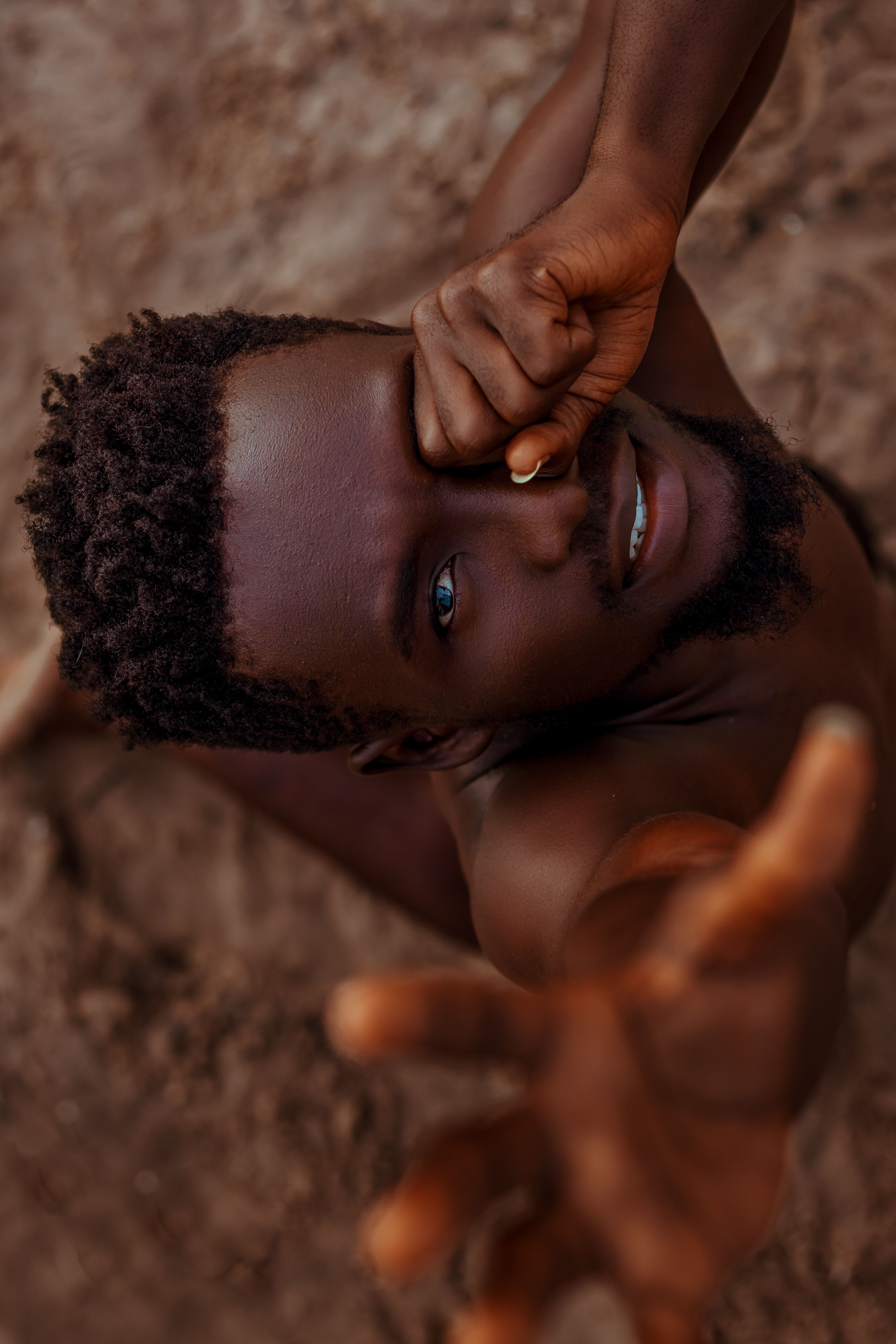 Dramatic Portrait of a Man Reaching Out · Free Stock Photo