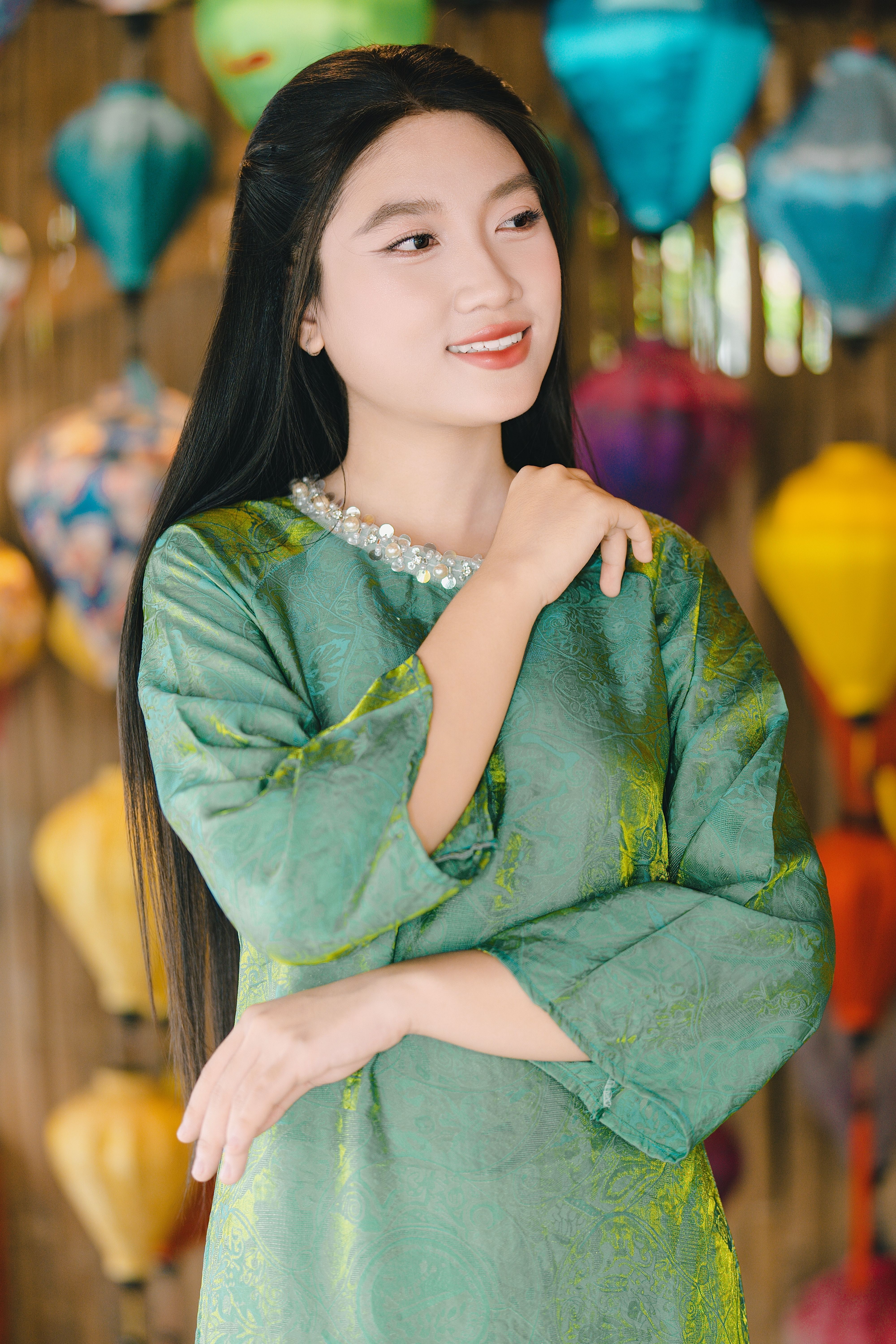 Woman in Traditional Dress with Colorful Lanterns · Free Stock Photo