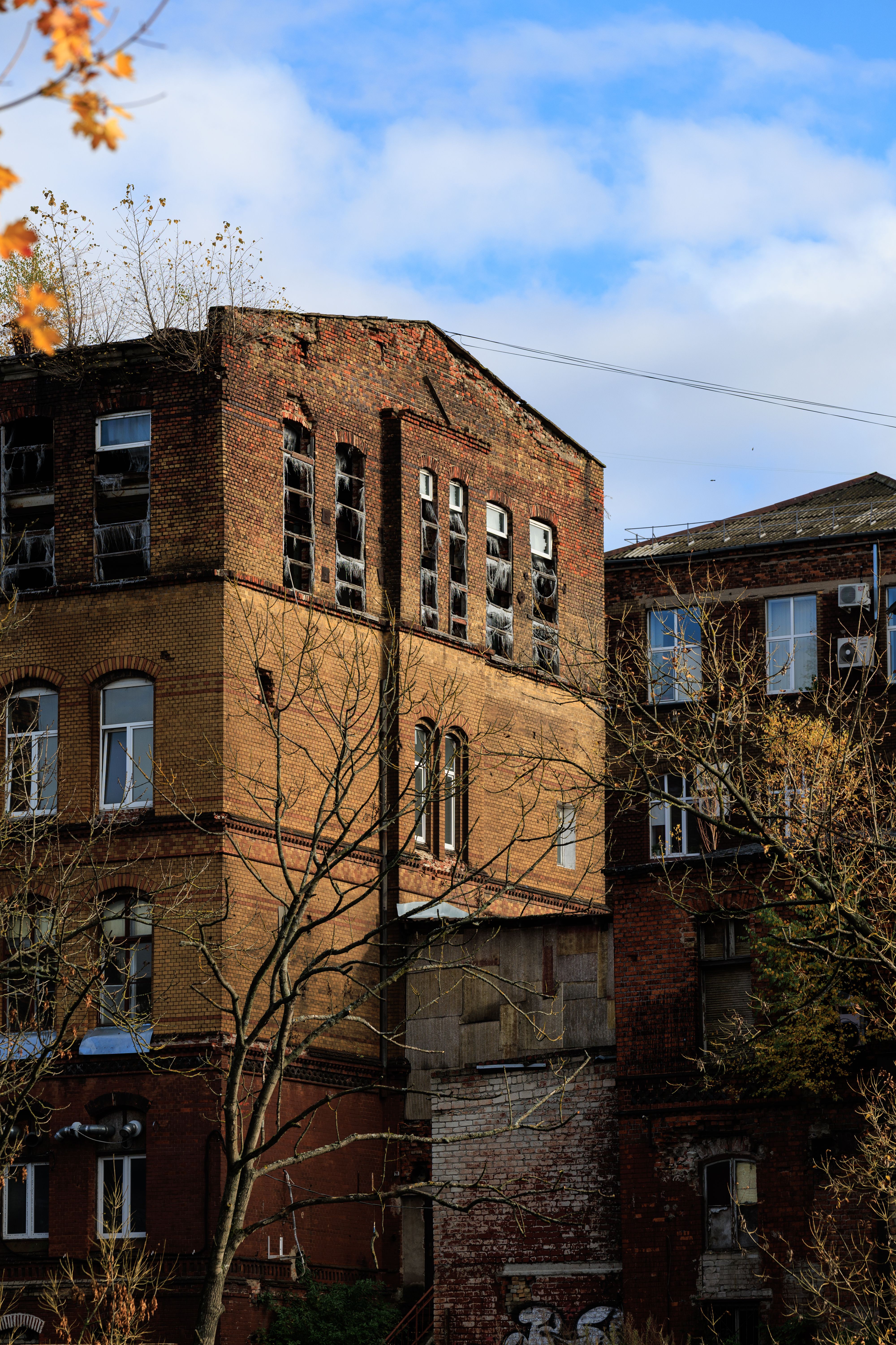 Abandoned Brick Building with Broken Windows · Free Stock Photo