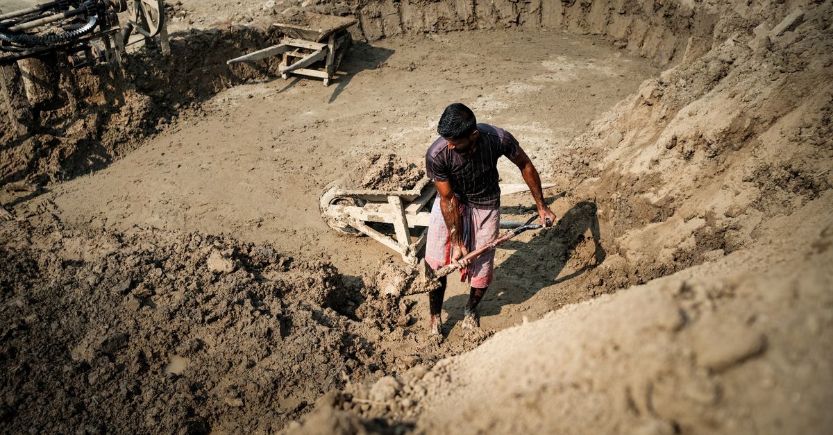 Digging By Compress Laborer Digging Earth in Construction Site · Free Stock Photo