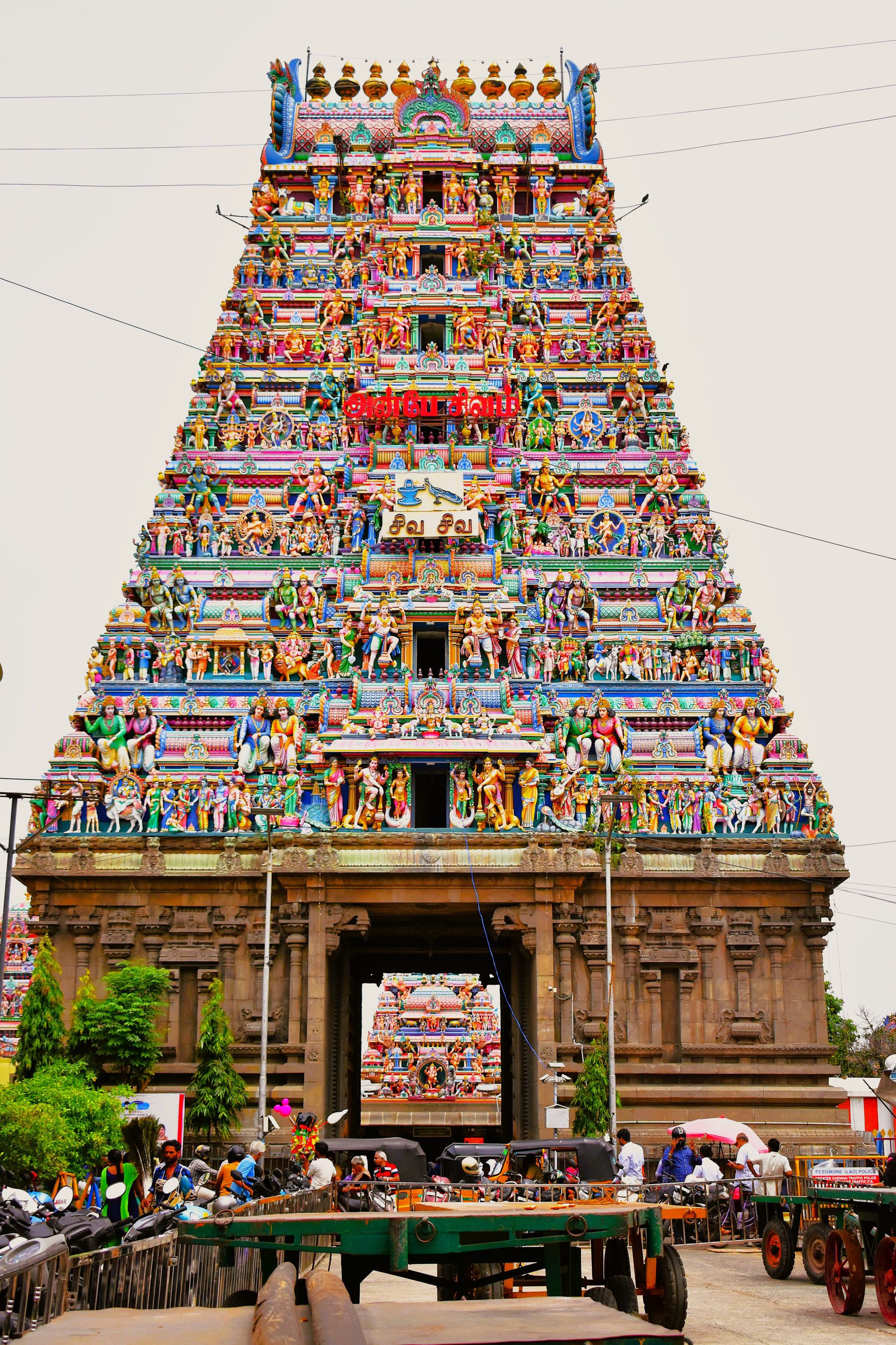 The gopuram of Kapaleeshwarar Temple rising above Mylapore rooftops