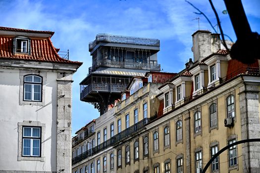 View of Lisbon's iconic Santa Justa Lift amidst classic European architecture.