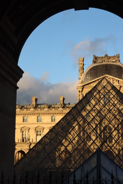 Window View Pyramids Louvre Pyramid Framed by Arched Window · Free Stock Photo
