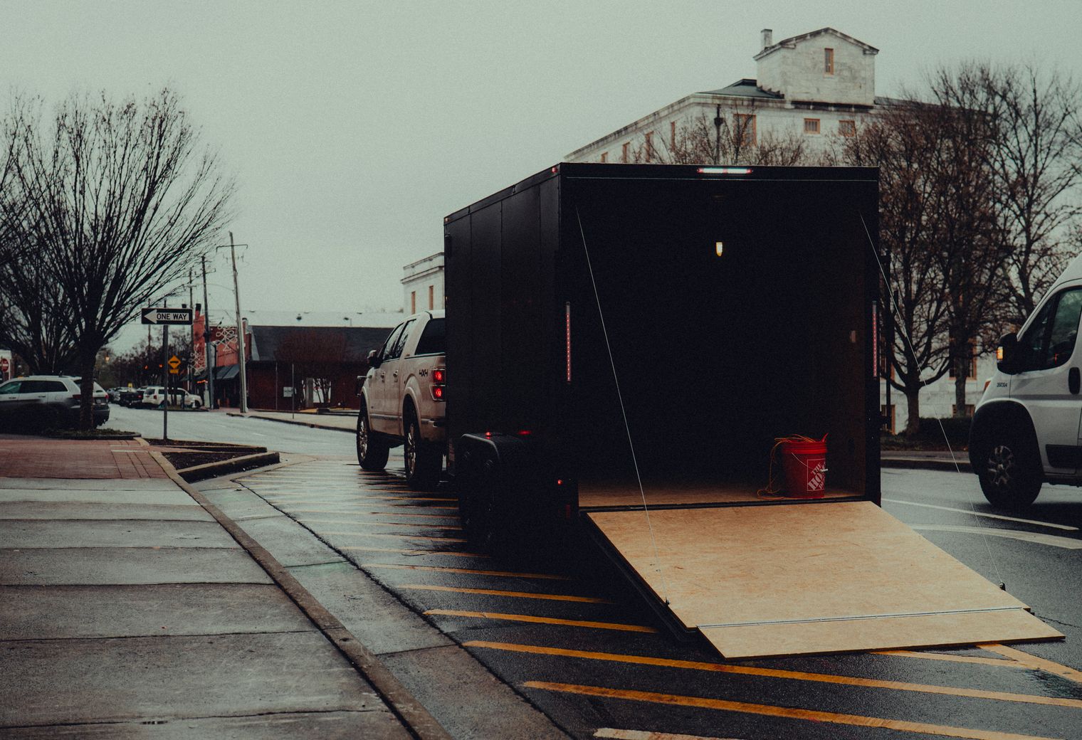 Ash — belongings being loaded for transport to storage