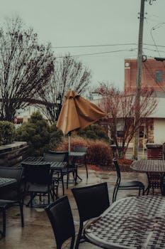 Empty cafe patio in downtown Canton, Georgia on a rainy, overcast day.