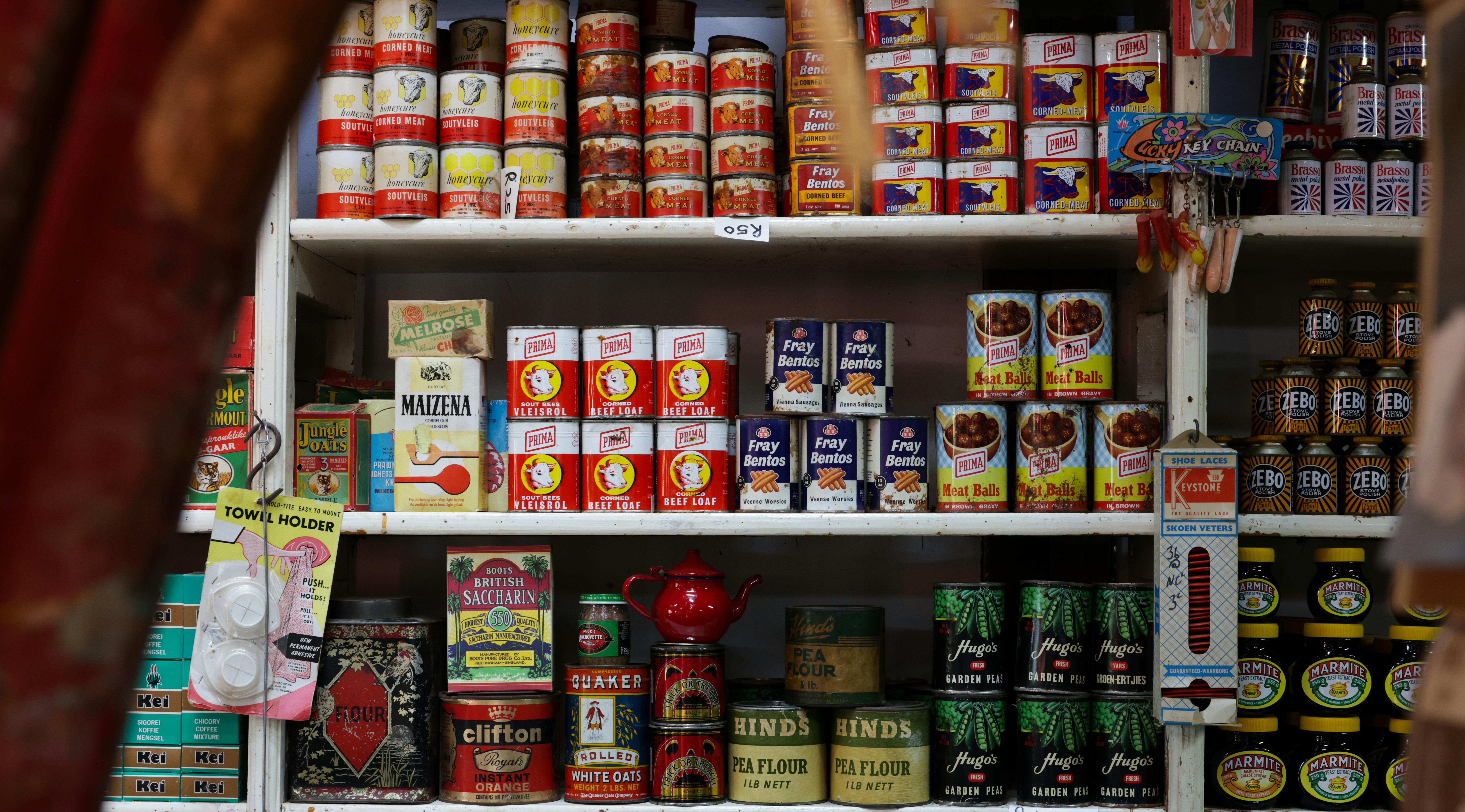 Explore classic canned goods on vintage grocery store shelves, showcasing nostalgic packaging and colors.