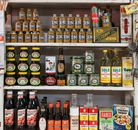 A nostalgic vintage grocery store shelf displaying classic products and retro packaging.