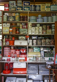 A nostalgic view of a vintage shop's retro collection with eclectic tins and containers.