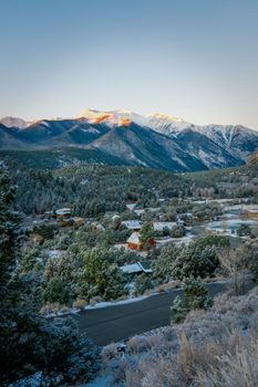 Beautiful snowy mountain and townscape view in Buena Vista, Colorado during sunrise.