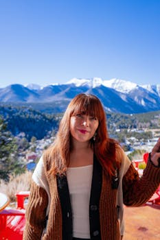 Woman posing with scenic mountain backdrop in Buena Vista, Colorado.