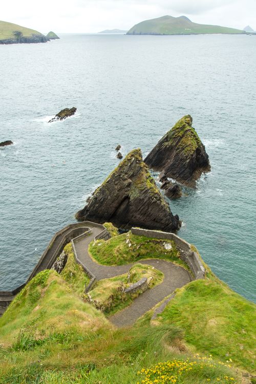 Free Explore the rugged beauty of Dunquin Pier, Ireland with its dramatic cliffs and winding paths. Stock Photo