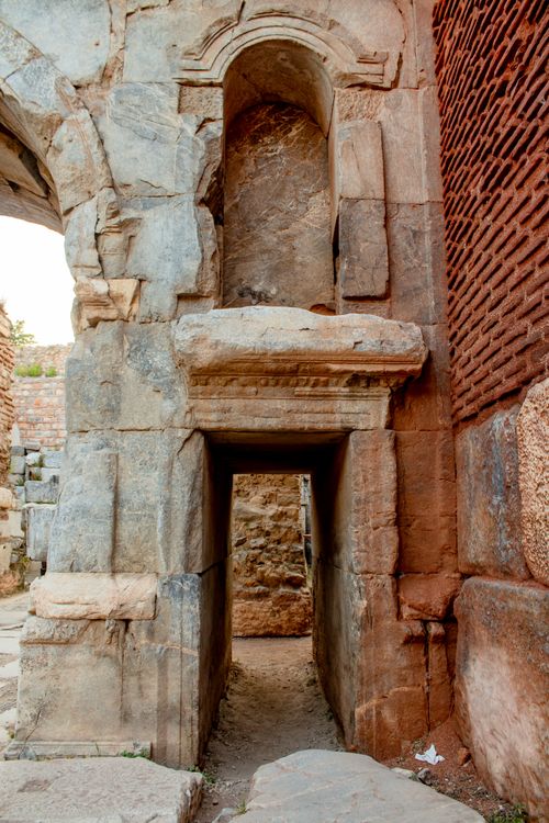 Free Explore the intricate details of this ancient stone passageway in historic ruins. Stock Photo