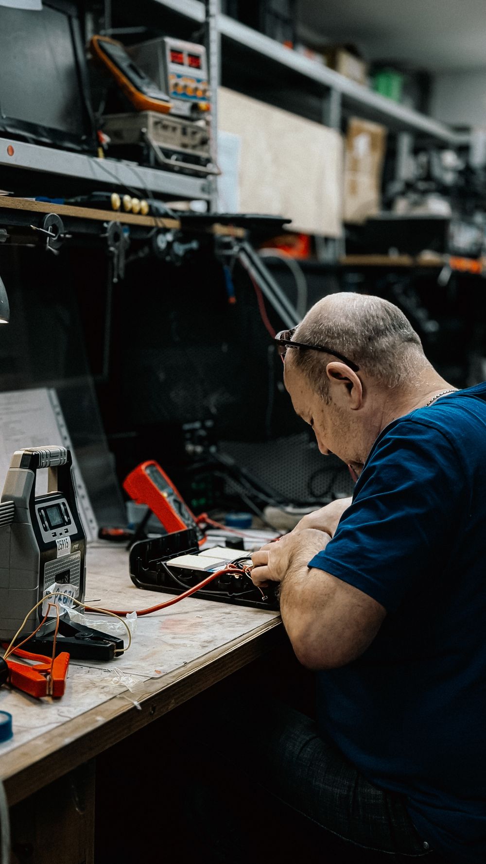 Soft starter control card being inspected