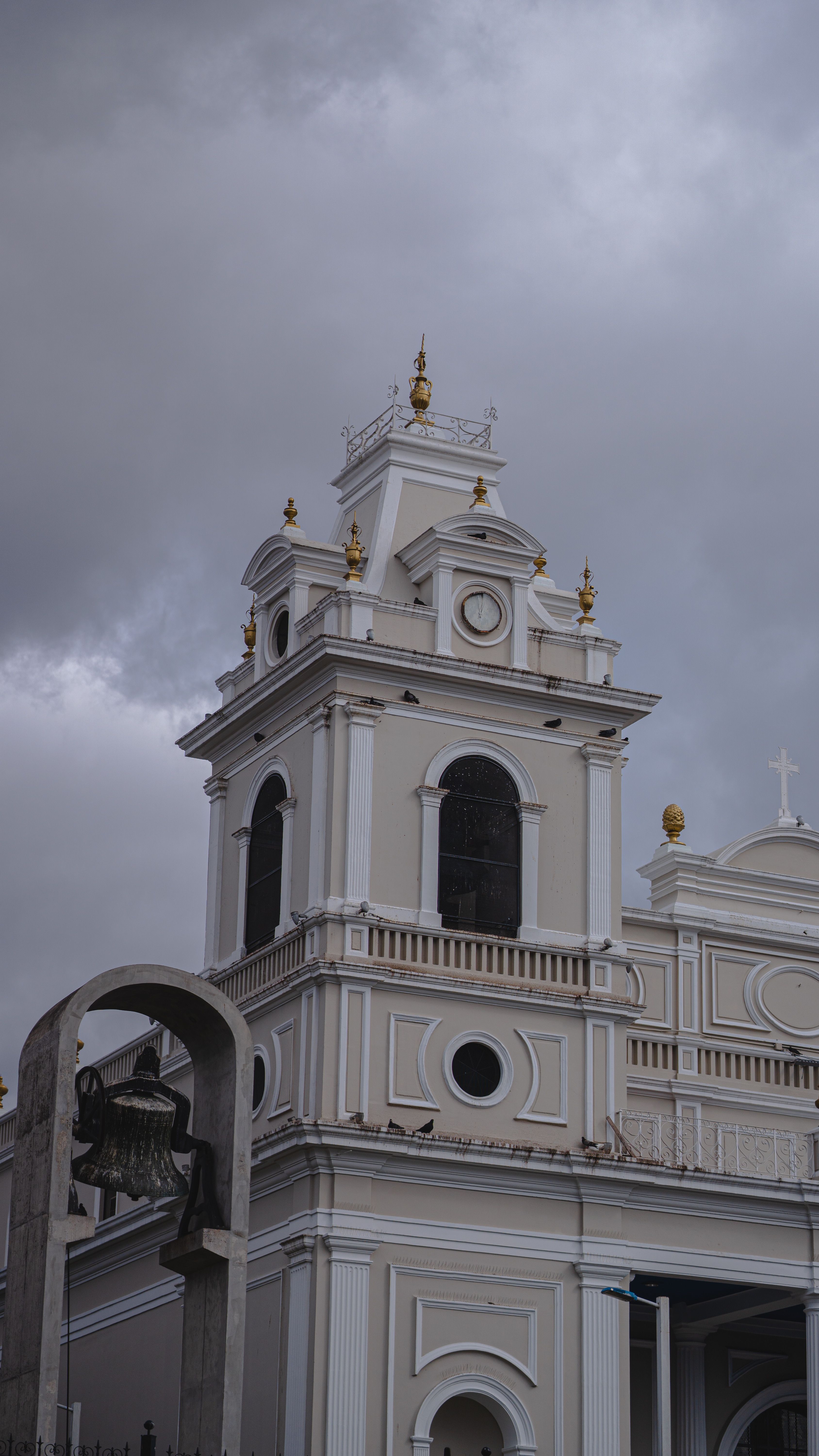 Historic Church Tower Against Cloudy Sky · Free Stock Photo