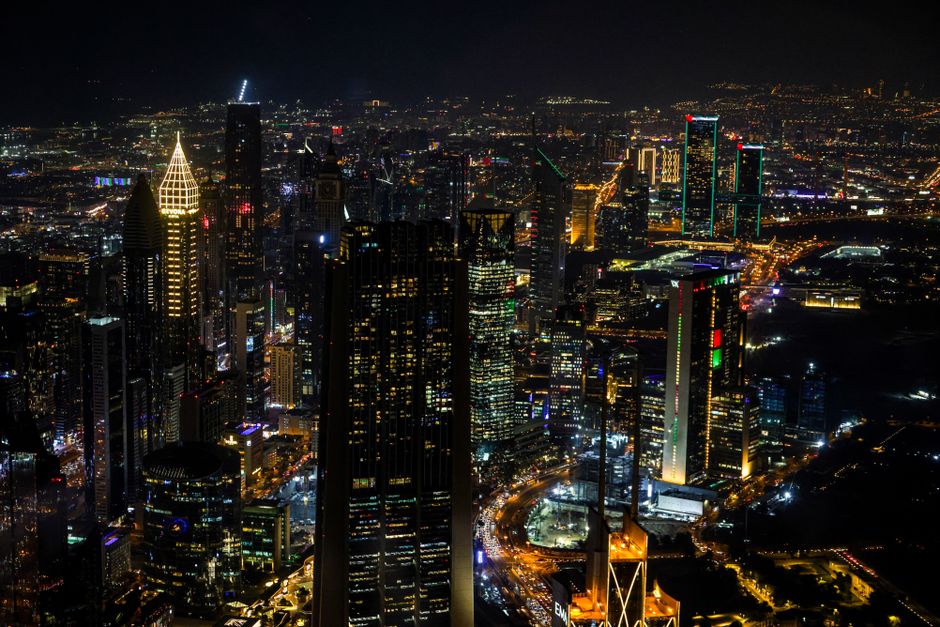 Incredible Private: Ultimate Dubai Helicopter Tour with Optional Transfers Review Review 2026 - A breathtaking aerial shot of Dubai's illuminated skyline showcasing modern architecture.