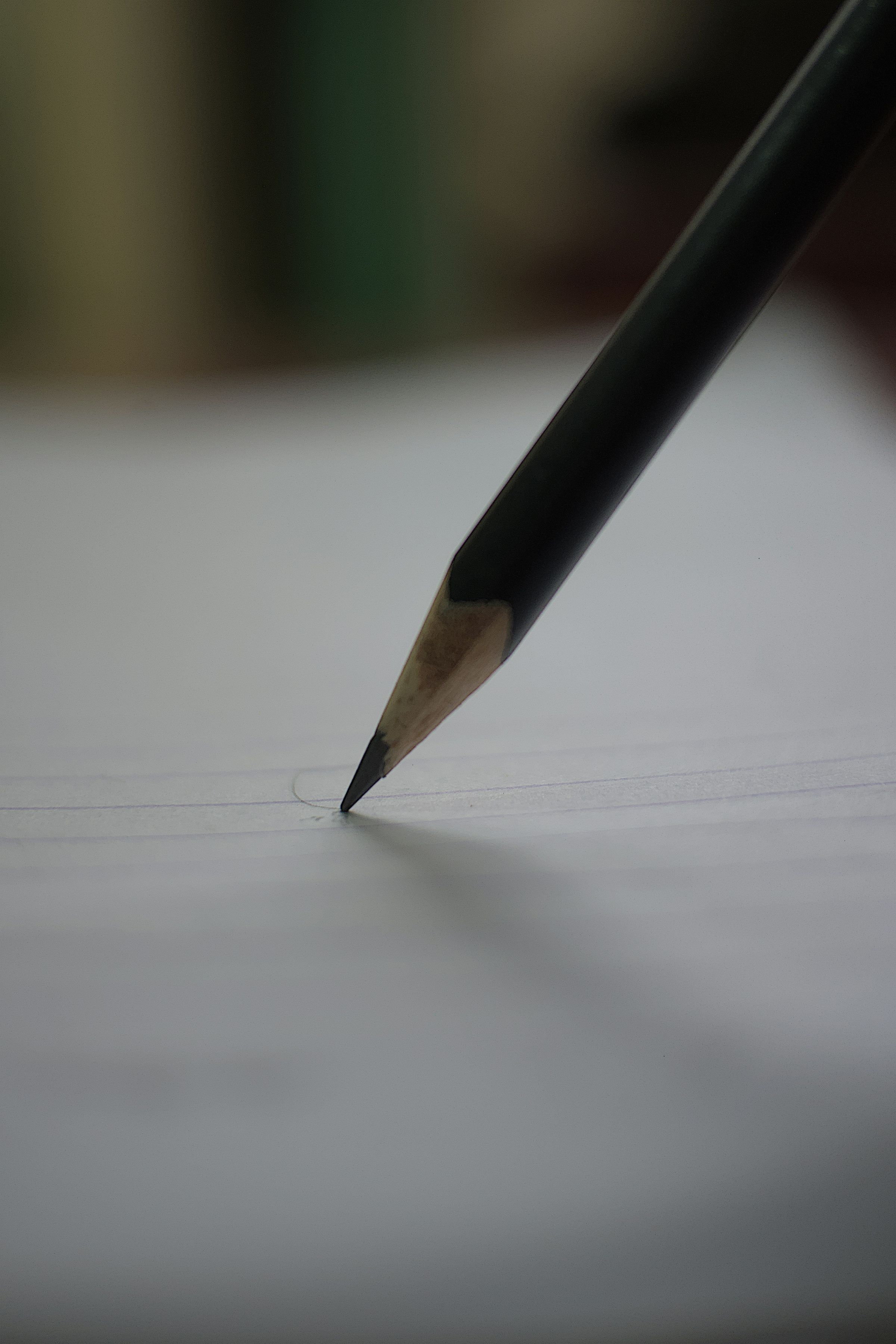 Macro photograph of a pencil tip marking paper