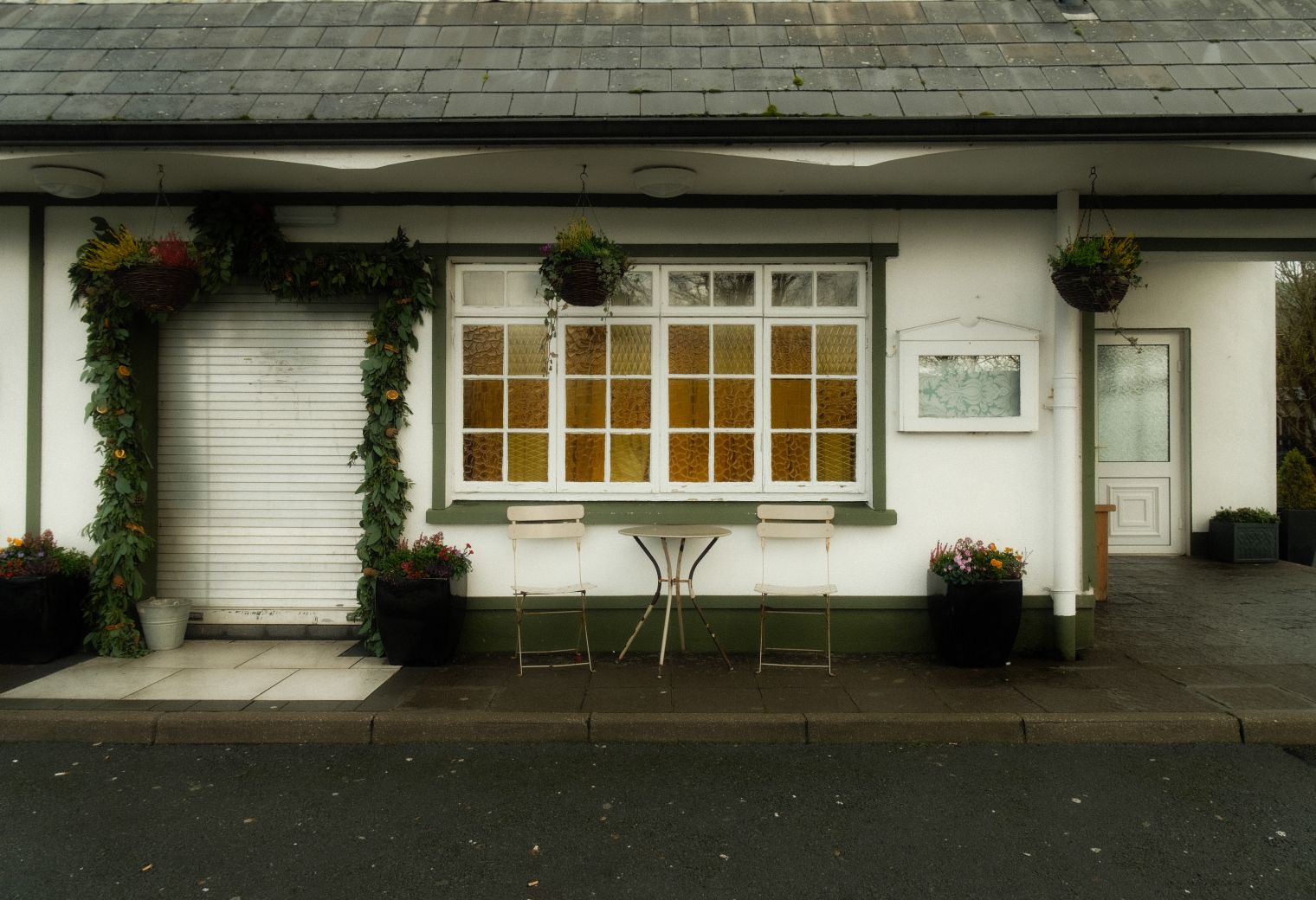 Wallpapering in Pinner — a decorator at work mid-project