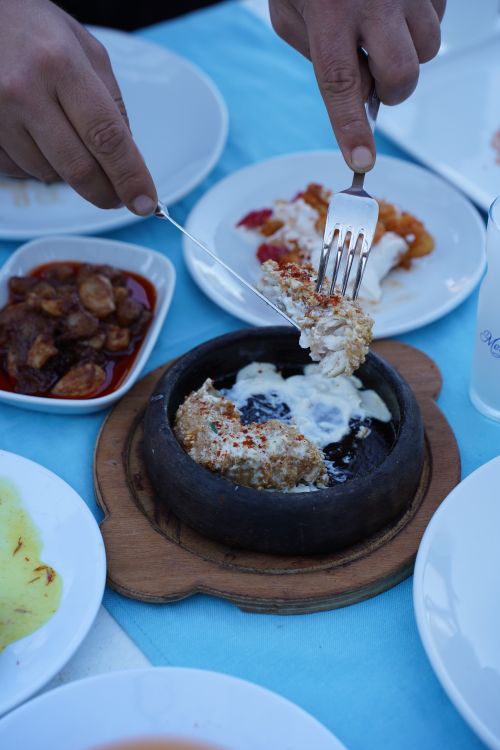 Free Enjoy an authentic Turkish meze spread with diverse dishes at a Çanakkale table. Stock Photo