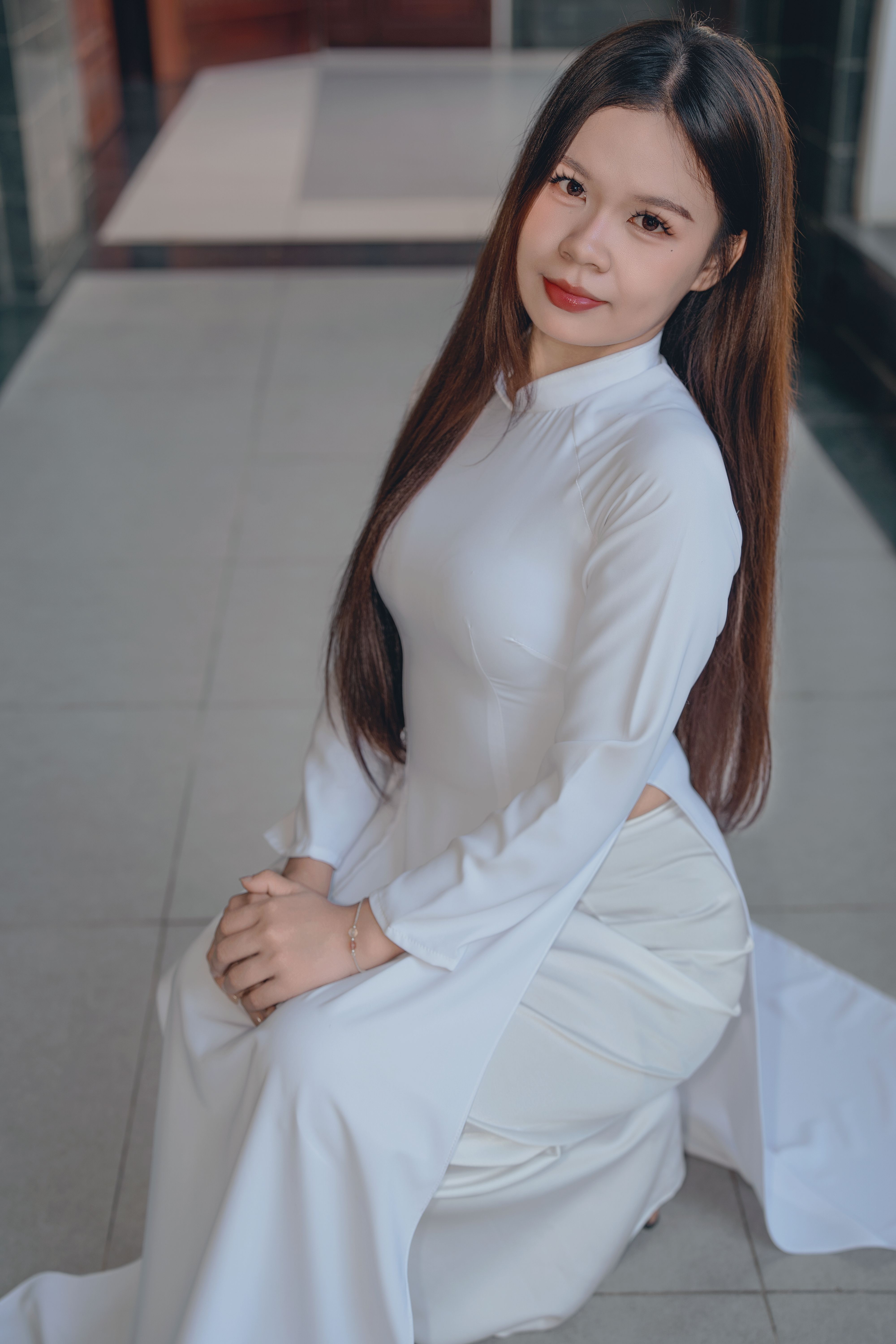 Elegant Woman in White Traditional Dress Indoors · Free Stock Photo