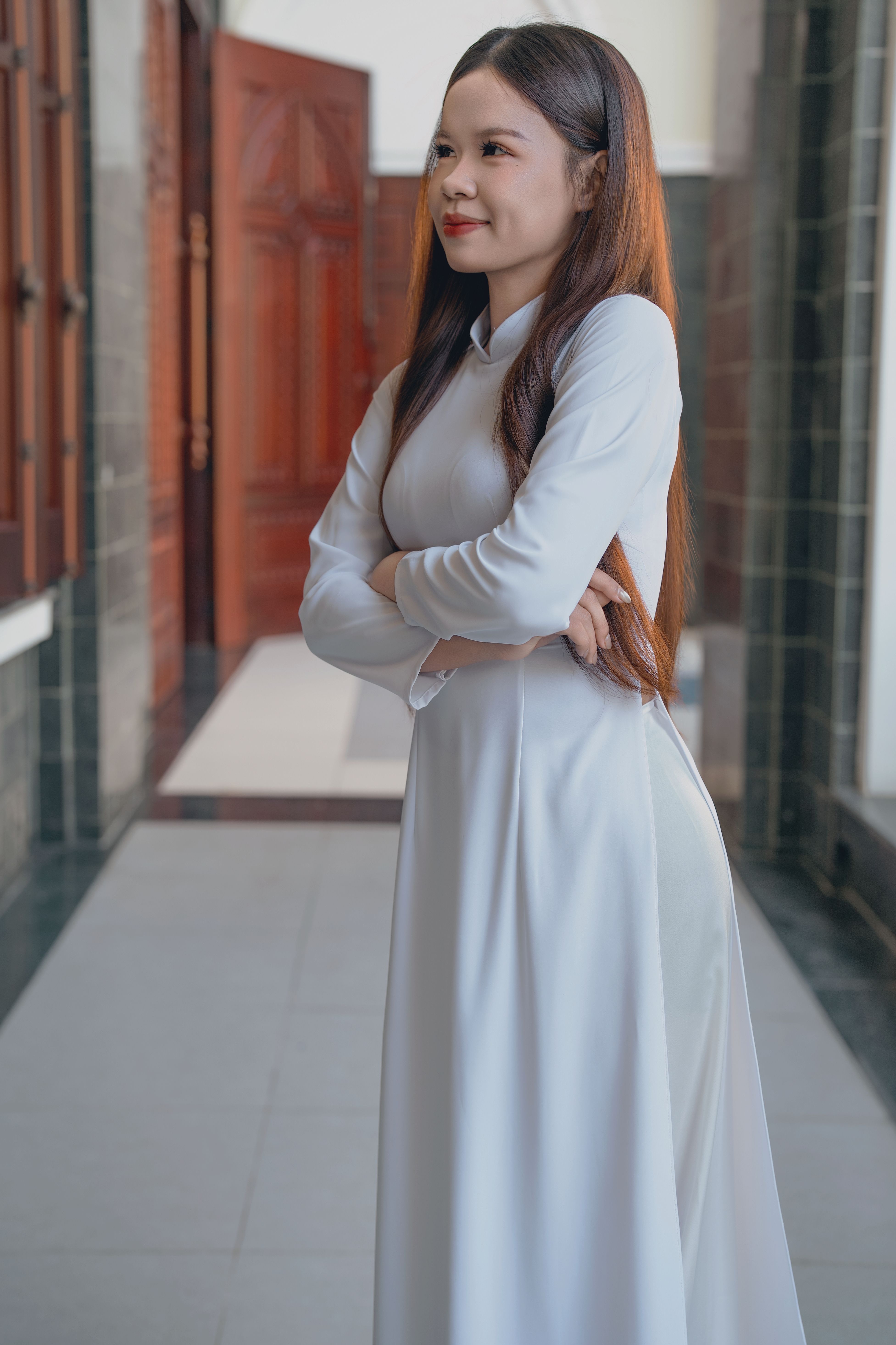 Elegant Woman in Traditional White Dress Indoors · Free Stock Photo