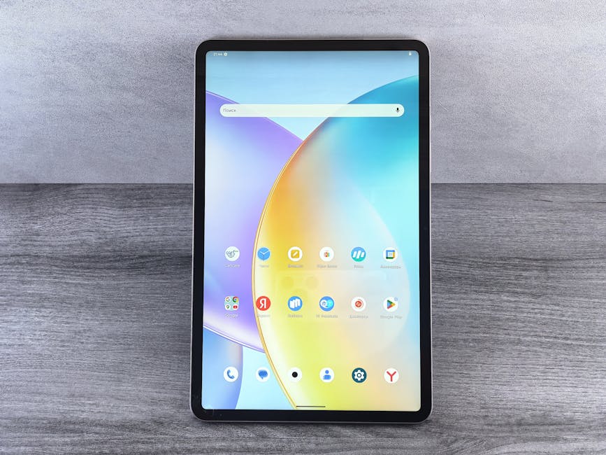 Staub vs Le Creuset: Enamel Durability and Heat Distribution Compared Front view of a modern tablet showing a colorful home interface with various app icons on display.