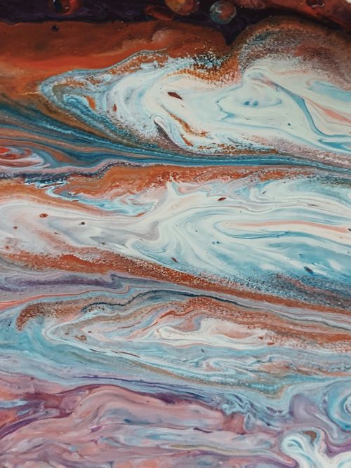 Free Dynamic abstract painting of swirling colors in blue, orange, and white, displaying fluid patterns and rich texture. Stock Photo