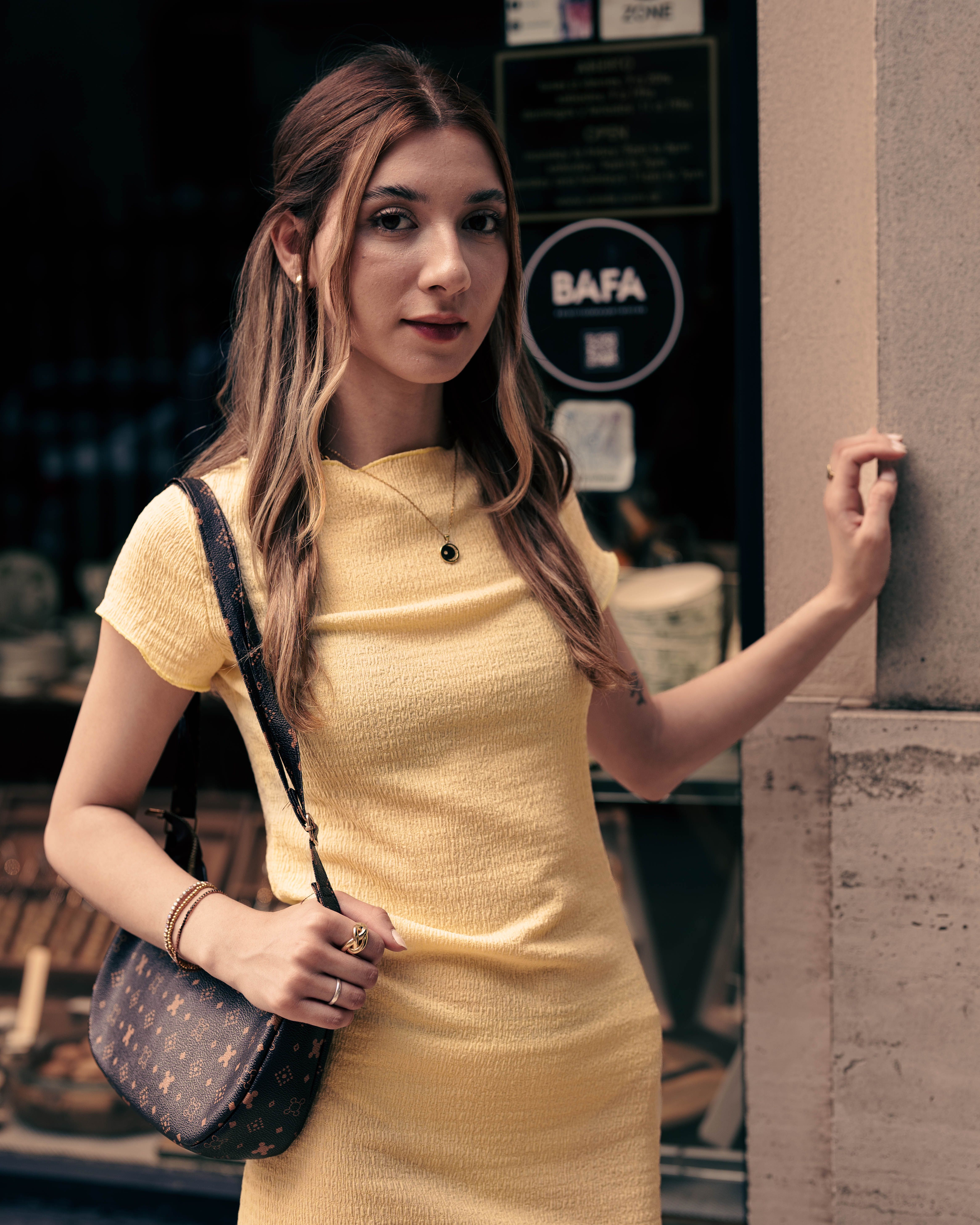 Stylish Woman in Yellow Dress by Storefront · Free Stock Photo
