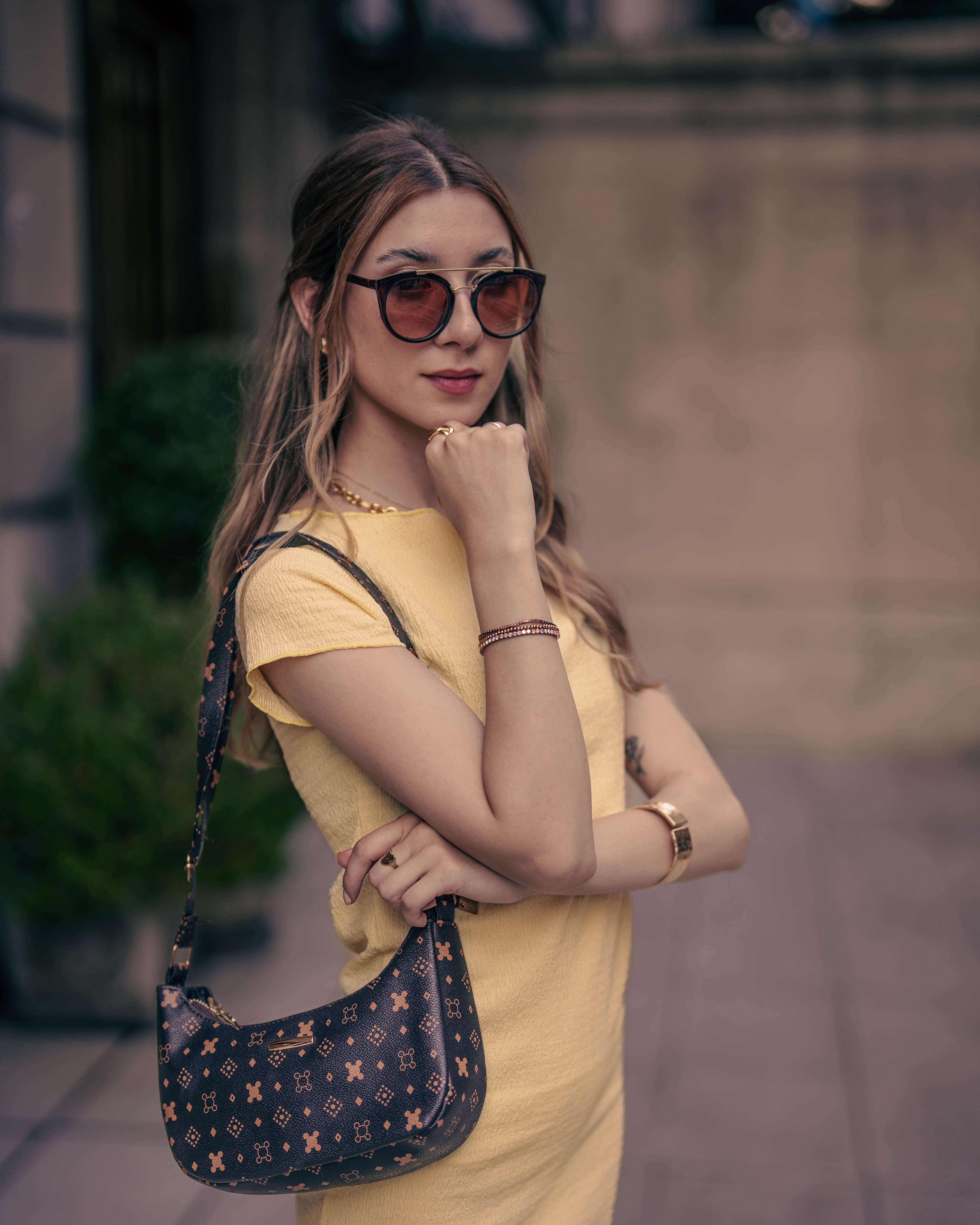 Stylish Woman in Yellow Dress with Sunglasses Outdoors · Free Stock Photo