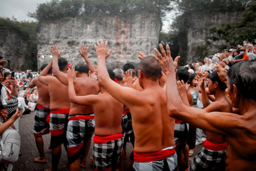 Traditional Kecak dance at Garuda Wisnu Kencana Cultural Park in Bali, Indonesia, showcasing cultural heritage.
