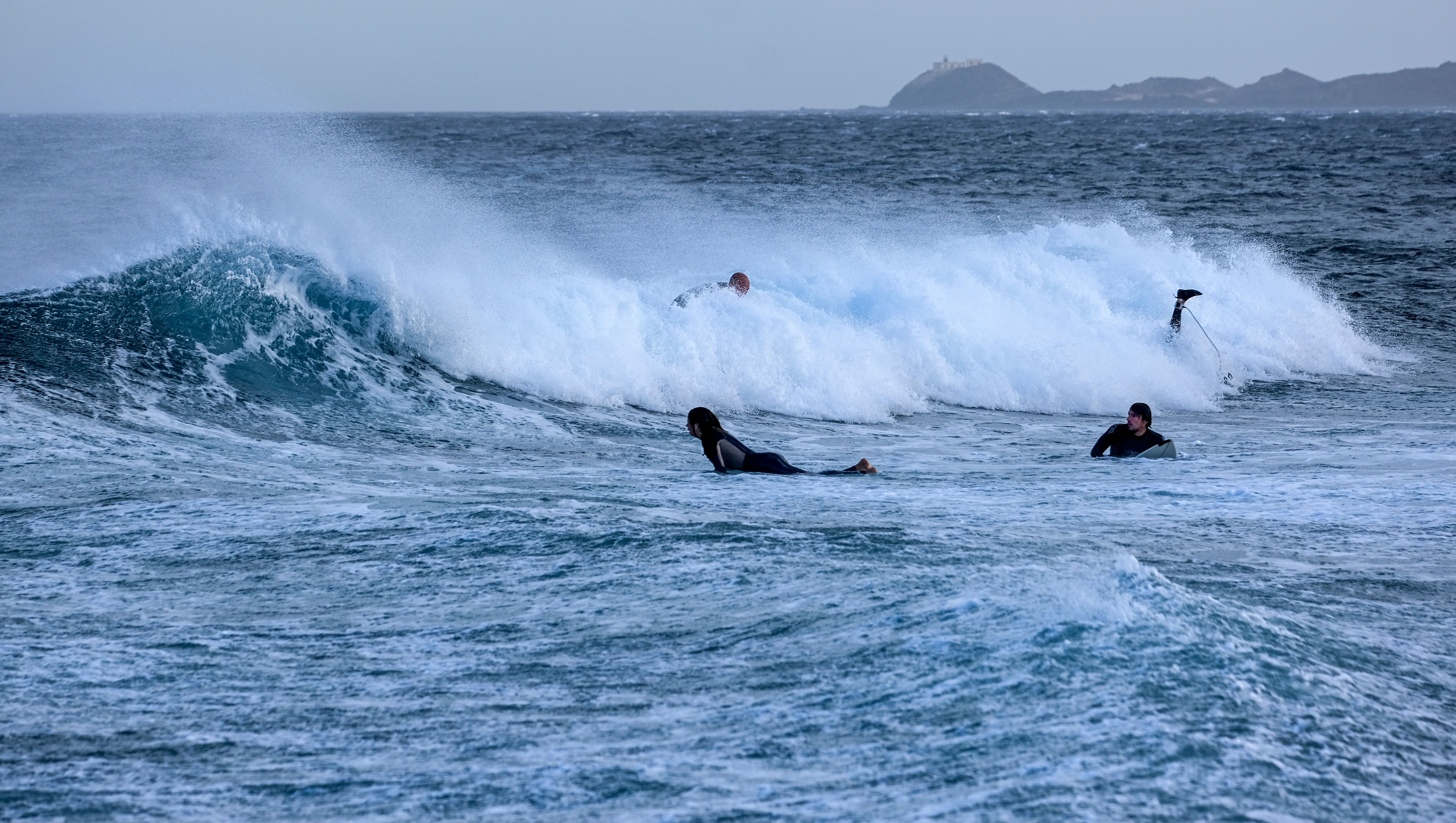 Surfers Riding Waves in Ocean Adventure · Free Stock Photo