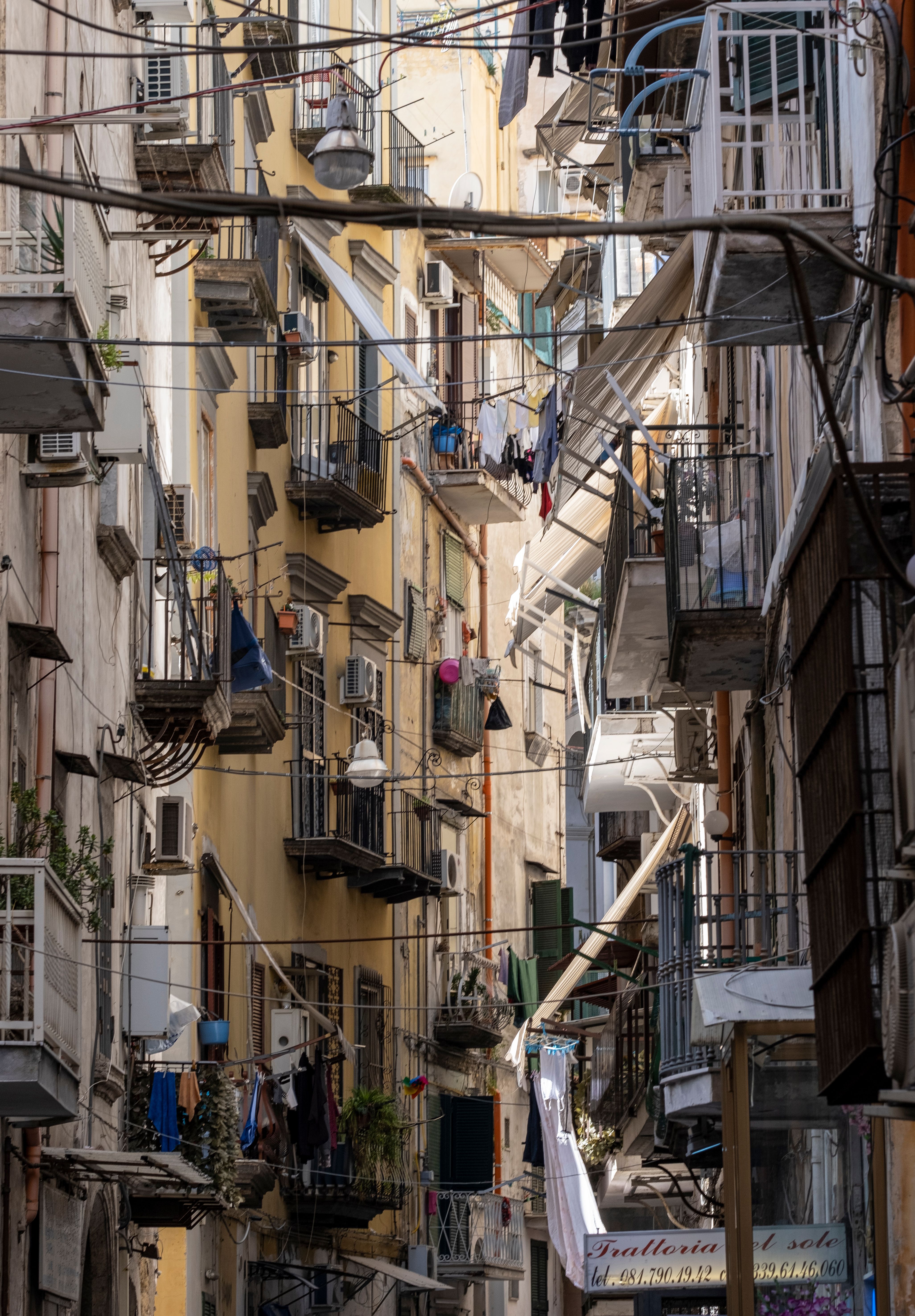 Scenic view of narrow alleys and balconies in Campania, Italy, showcasing urban charm.