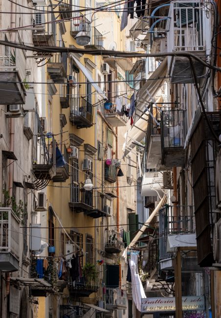 Scenic view of narrow alleys and balconies in Campania, Italy, showcasing urban charm.