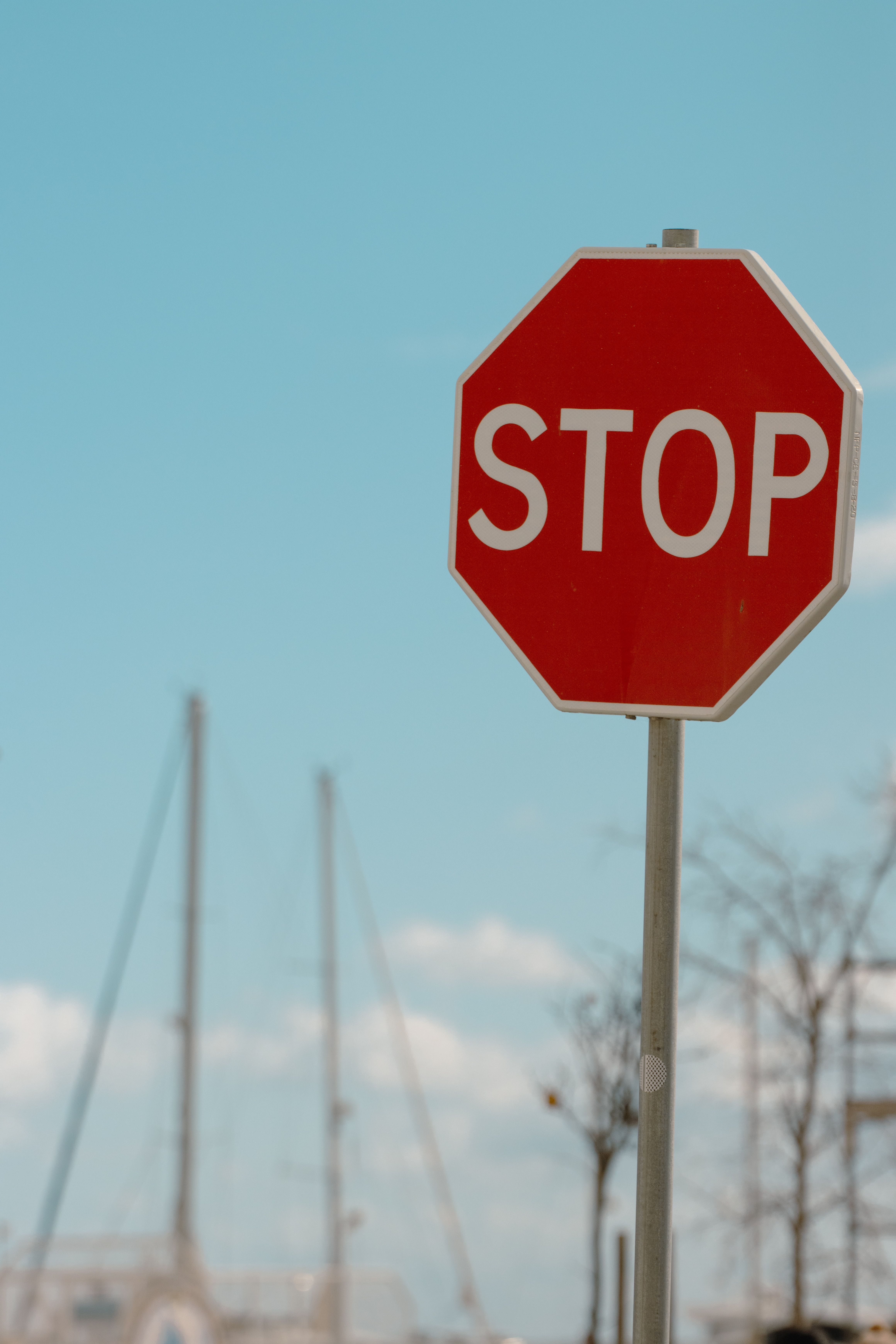Bright Stop Sign with Nautical Background in Olhão · Free Stock Photo