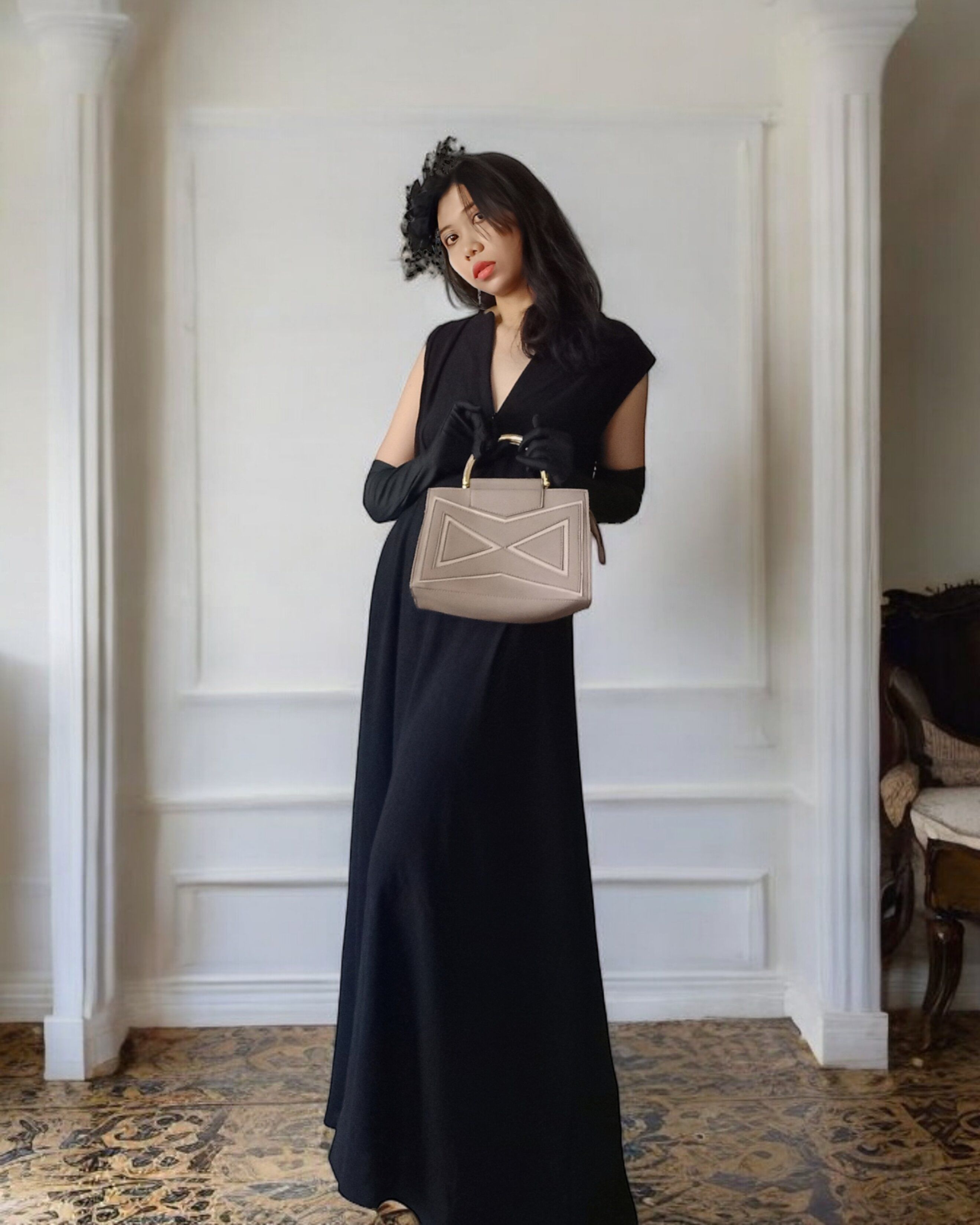 Elegant Woman in Black Dress with Stylish Handbag · Free Stock Photo