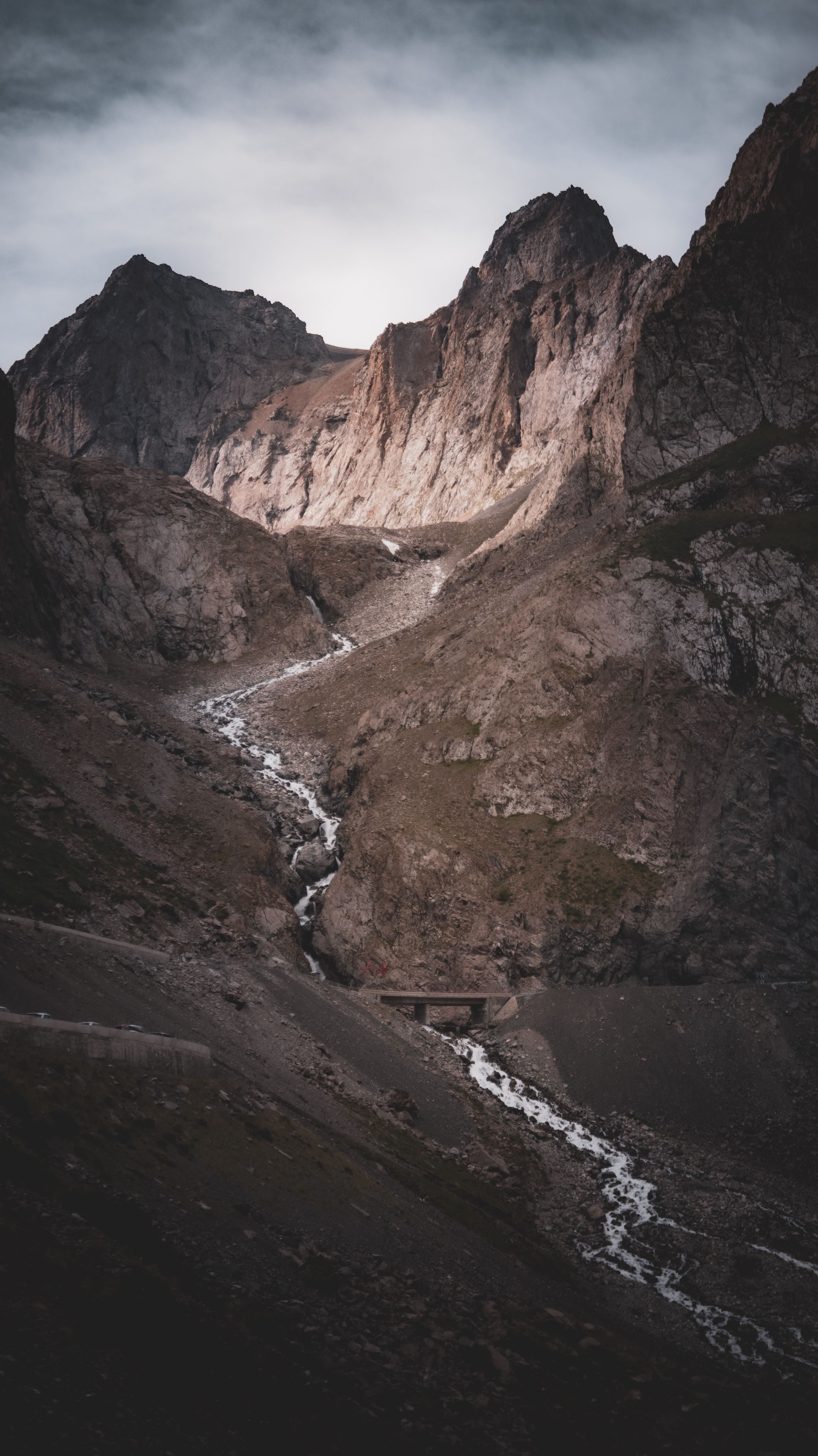 Dramatic Mountain Landscape with a Stream · Free Stock Photo