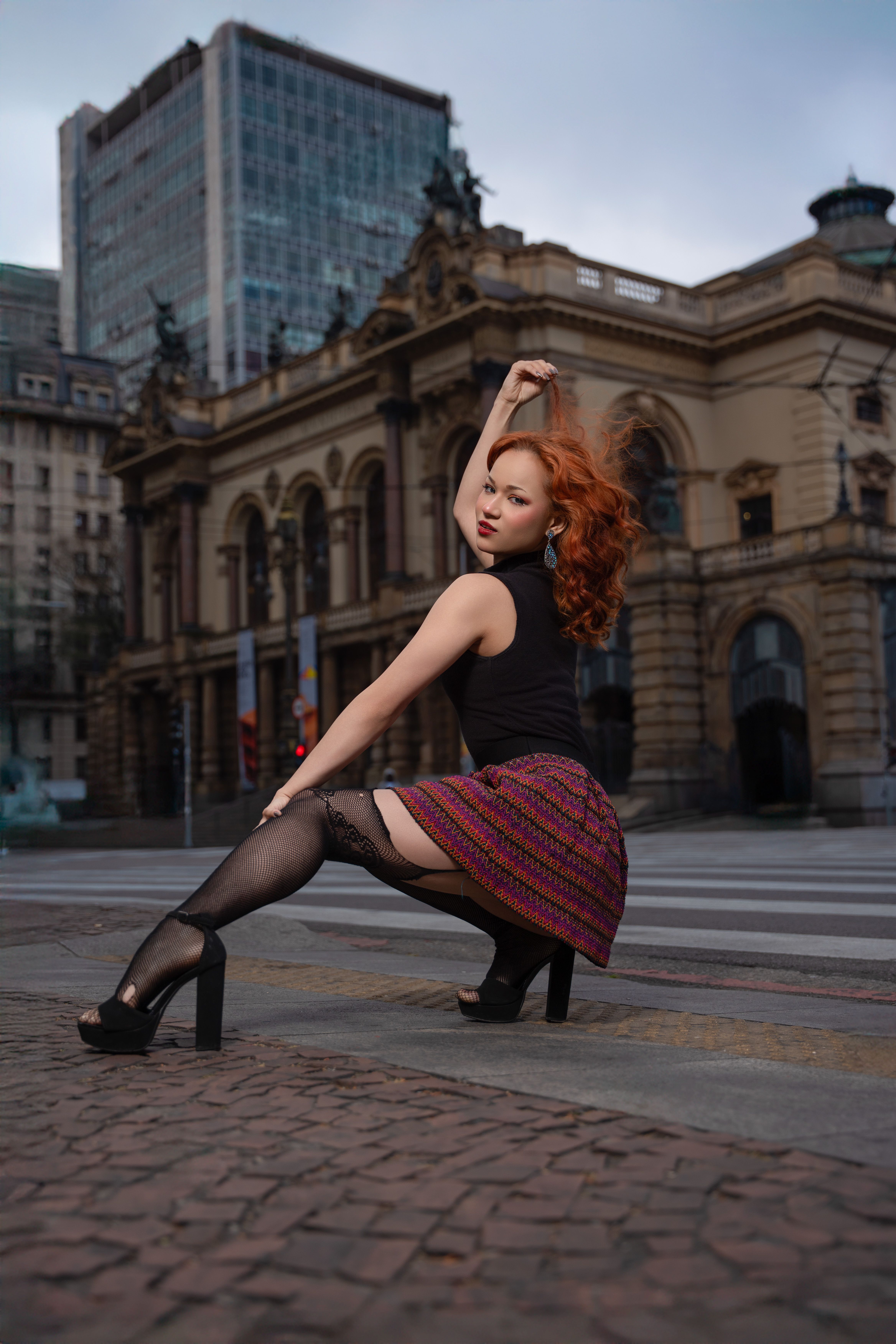 Confident Woman Posing in Urban Setting · Free Stock Photo