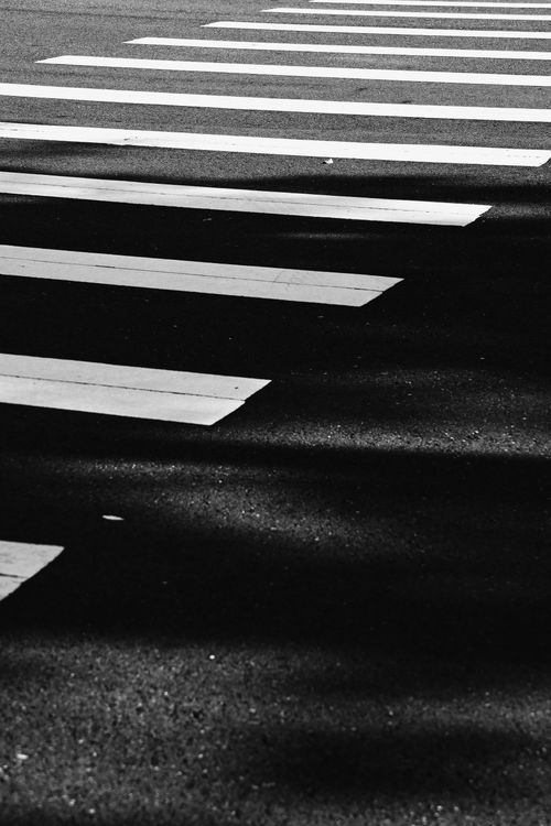 Free Stylish black and white photo of crosswalk lines in Taipei, Taiwan. Stock Photo
