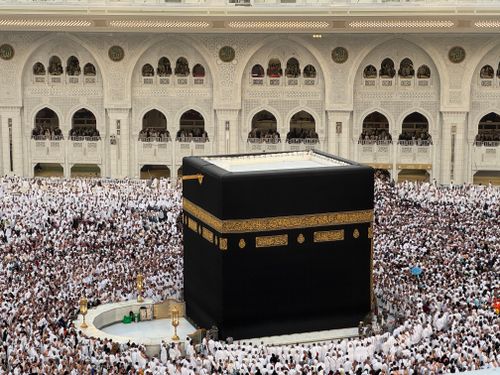 Free Aerial view of the Kaaba surrounded by pilgrims during Hajj in Mecca, Saudi Arabia. Stock Photo