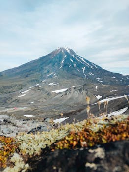 Stunning view of a snow-capped mountain with rugged terrain in an outdoor setting.
