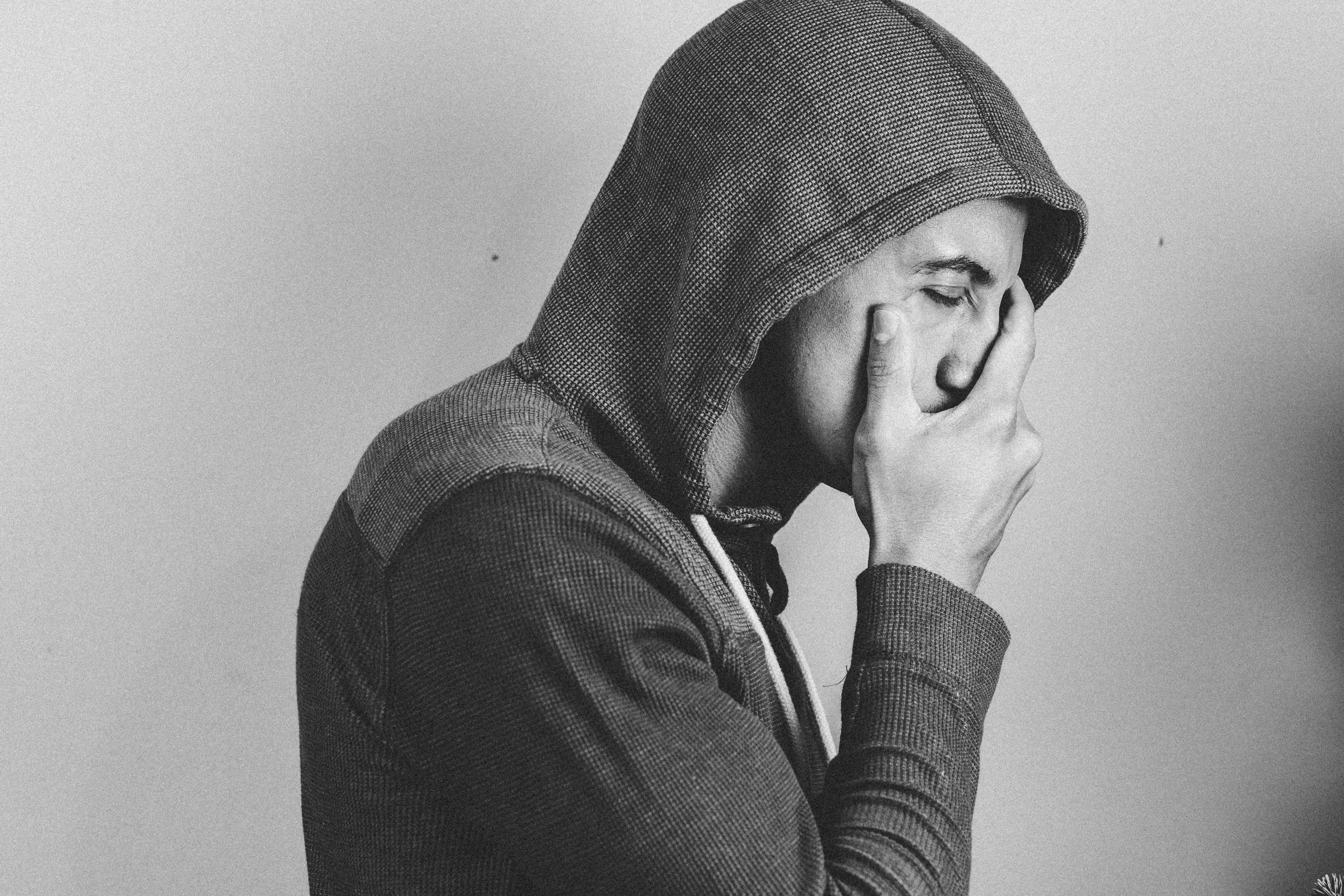 Man Holding His Face · Free Stock Photo