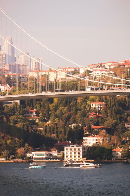 Free Captivating view of Istanbul with the 15 July Martyrs Bridge and Bosphorus Strait in vibrant sunlight. Stock Photo