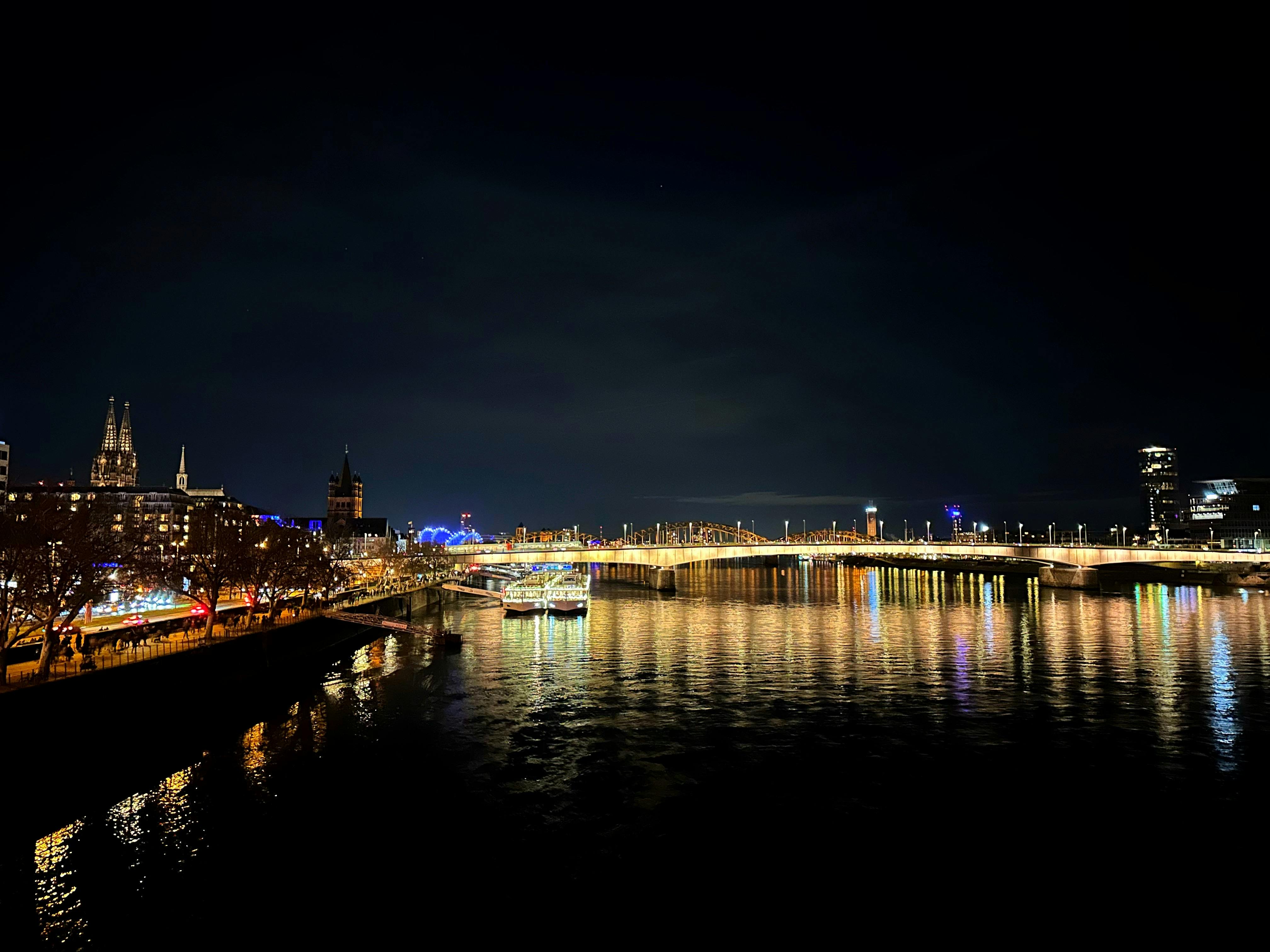 Cologne Rhine river evening walk with city skyline