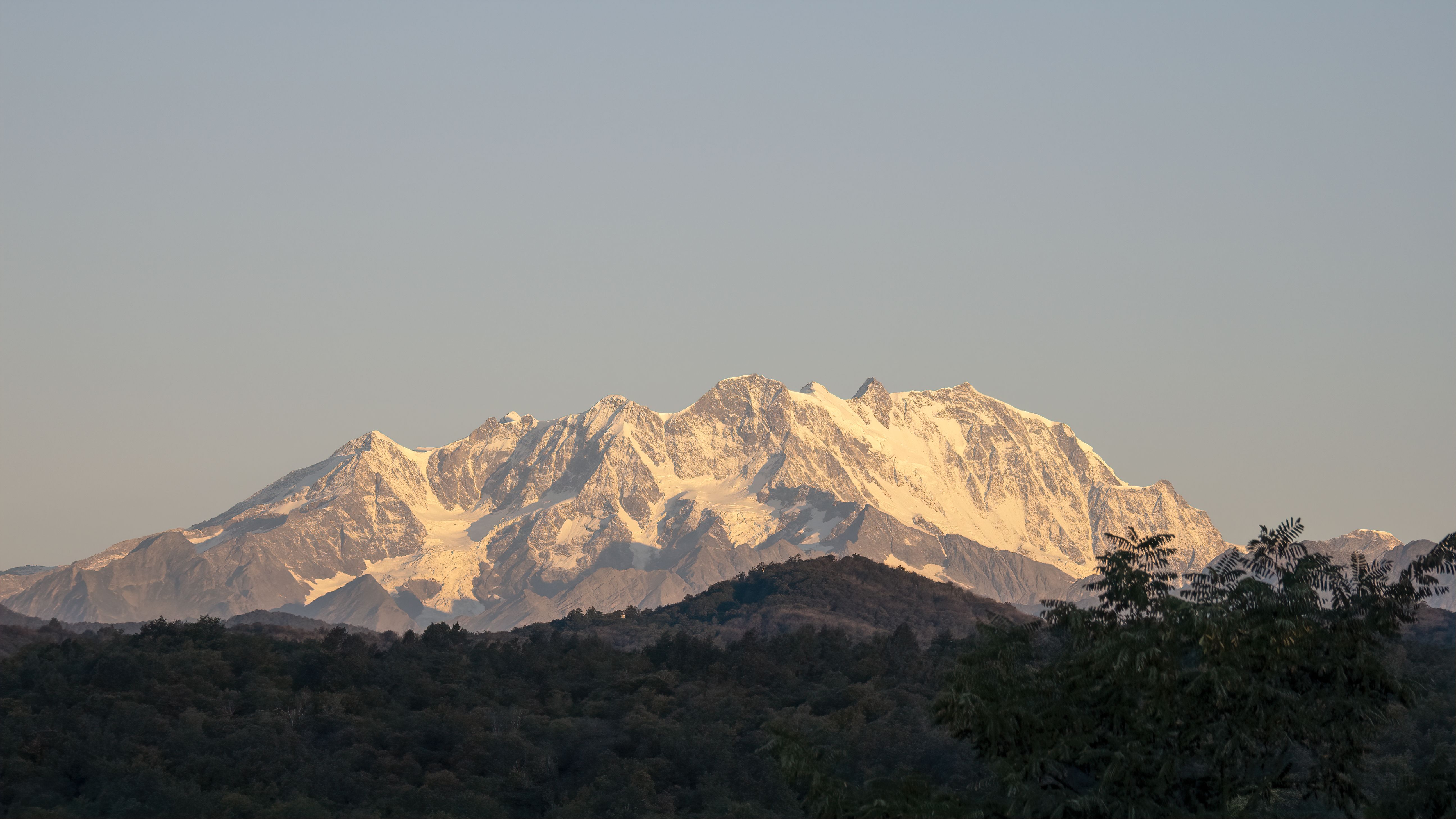 Beautiful view of snow-covered Himalayan mountains under a clear sky.