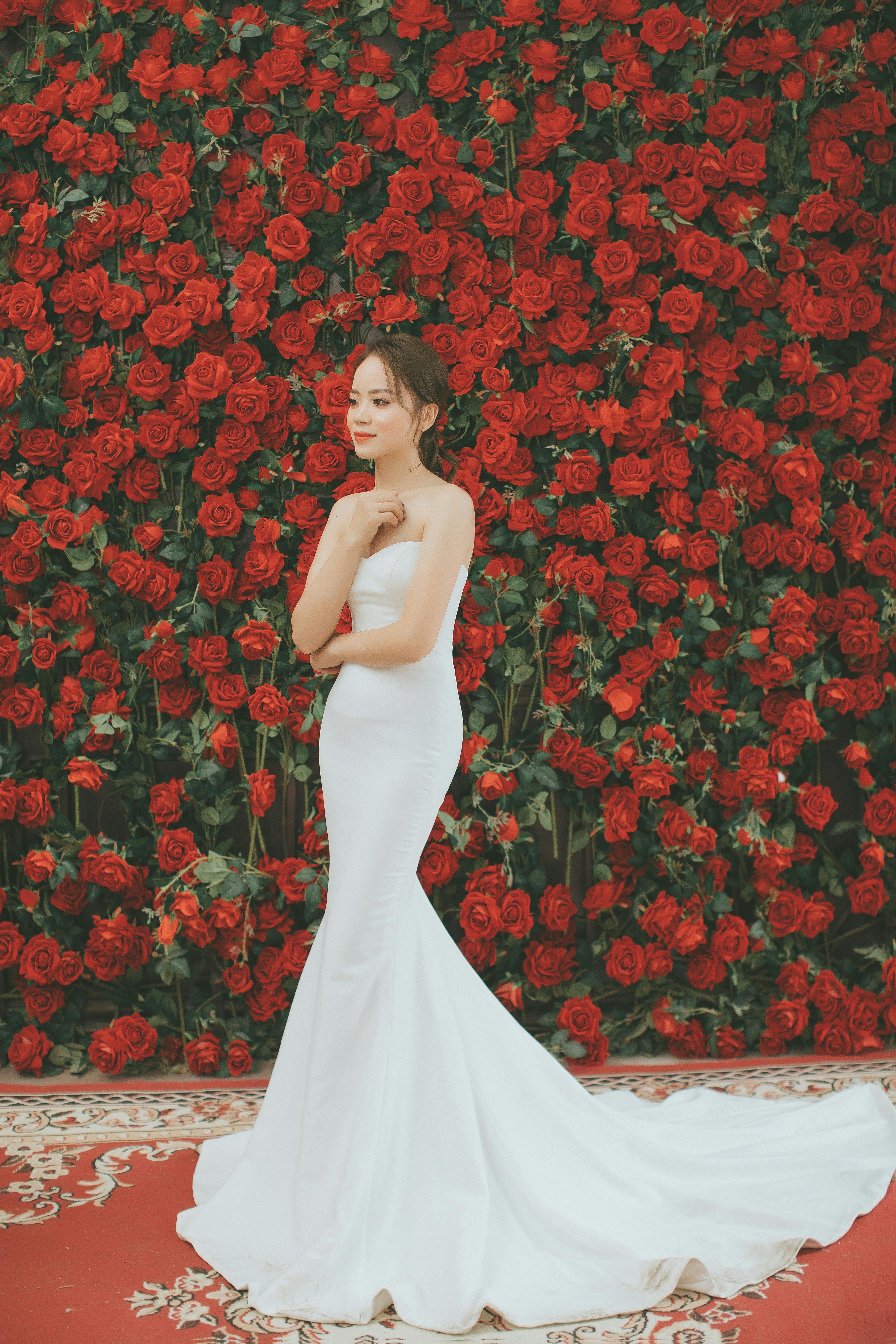 Long white dress with red clearance roses