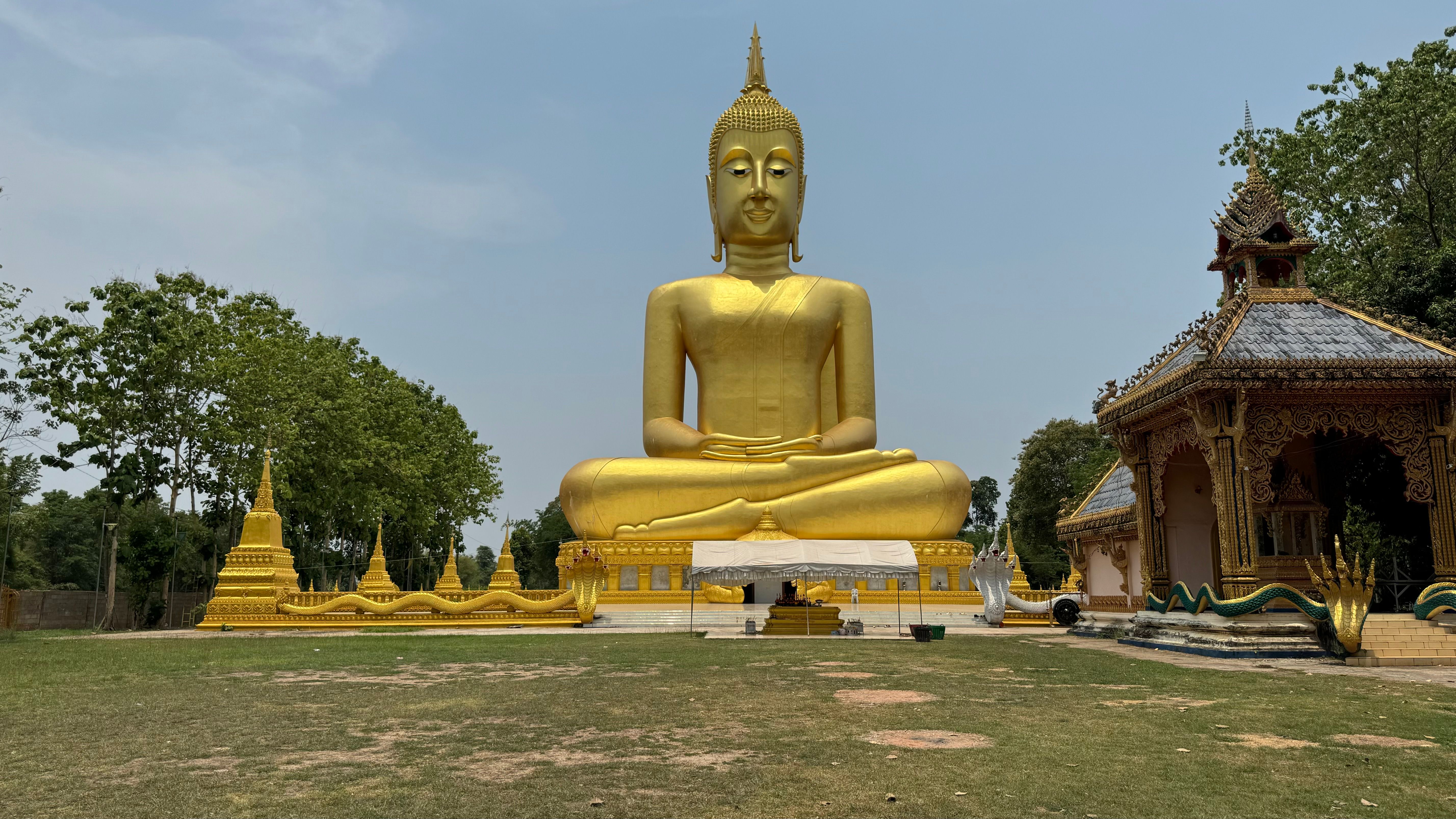 Magnificent golden Buddha statue in Laos, a symbol of serenity and spirituality.. Photo by Khamkeo  Phengsavad on Pexels